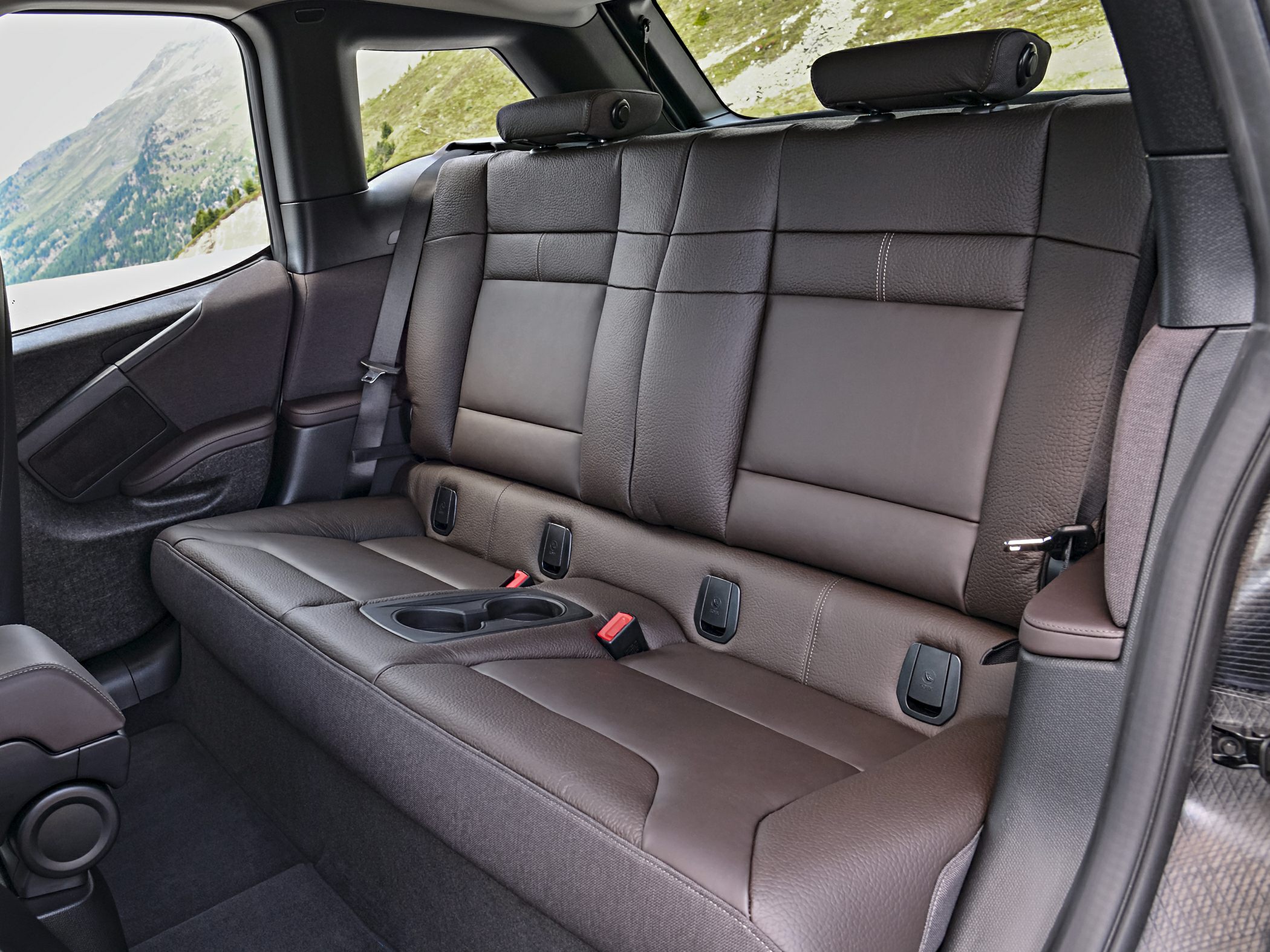 Rear leather seats with cup holders and seat belts