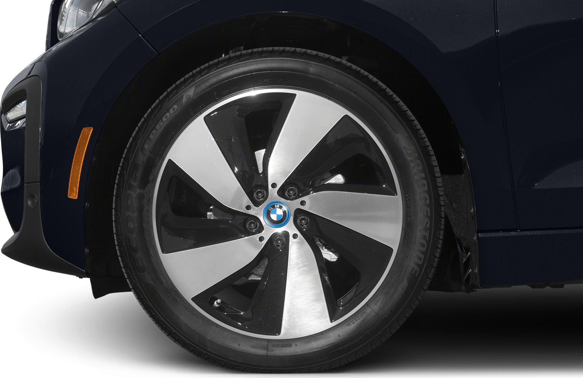 Close-up of BMW i3 alloy wheel with black and silver pattern
