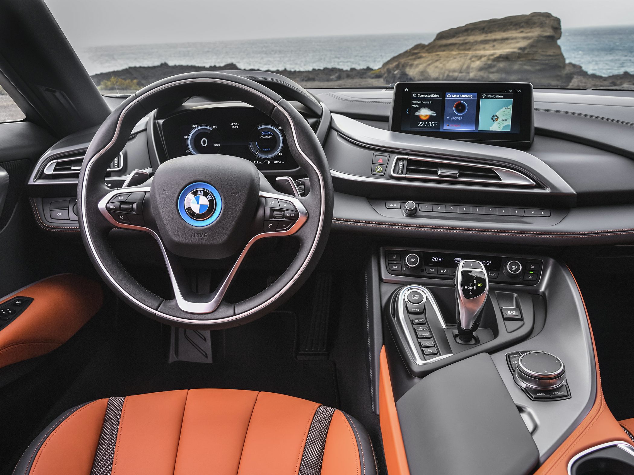Digital dashboard and central console with gear shifter and infotainment system