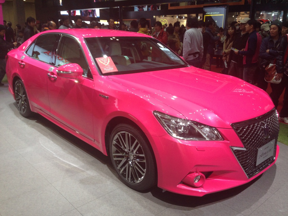 Sporty front grille and alloy wheels on luxury sedan