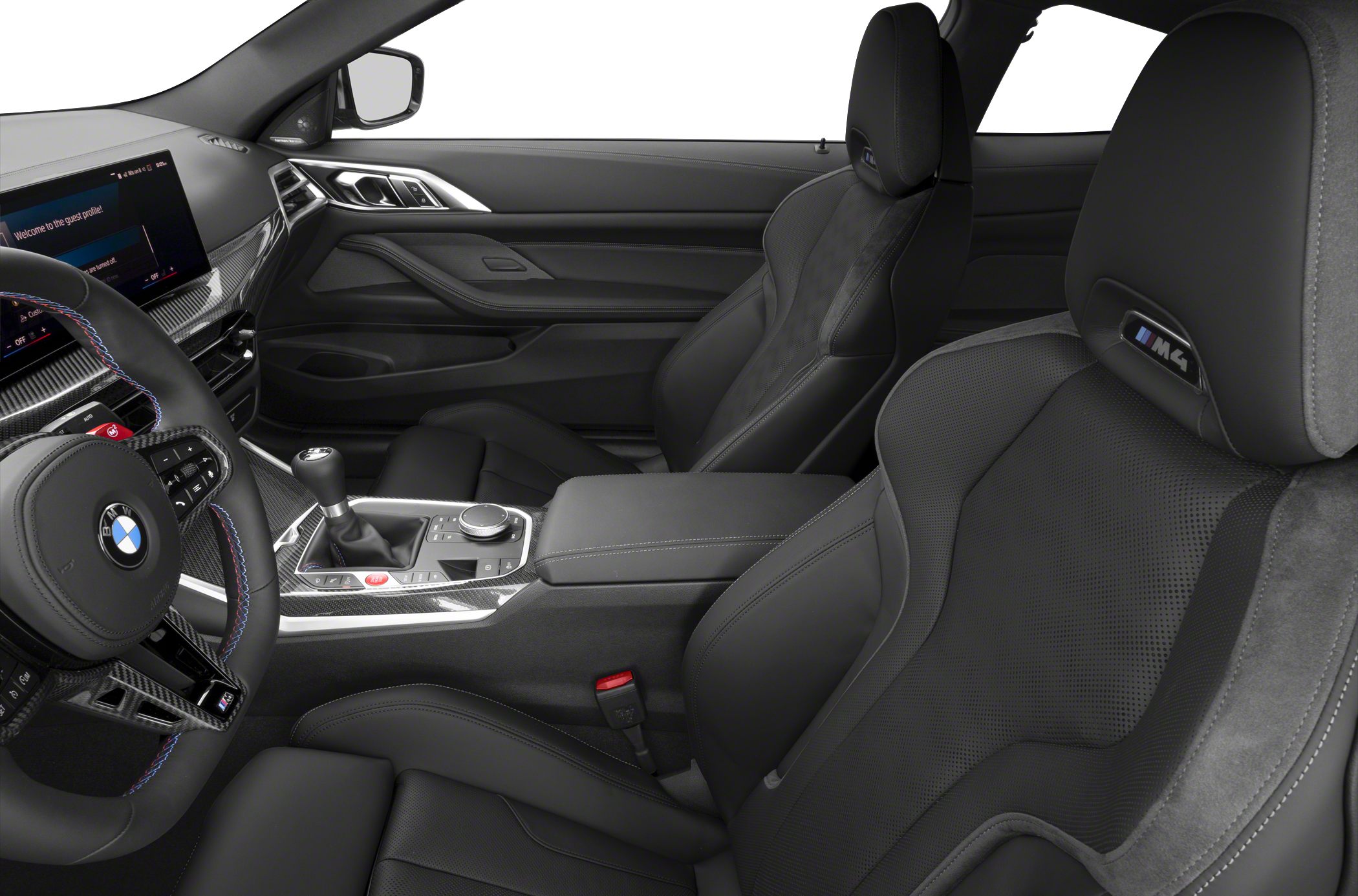 BMW interior with sport seats, carbon fiber trim, manual gear shifter