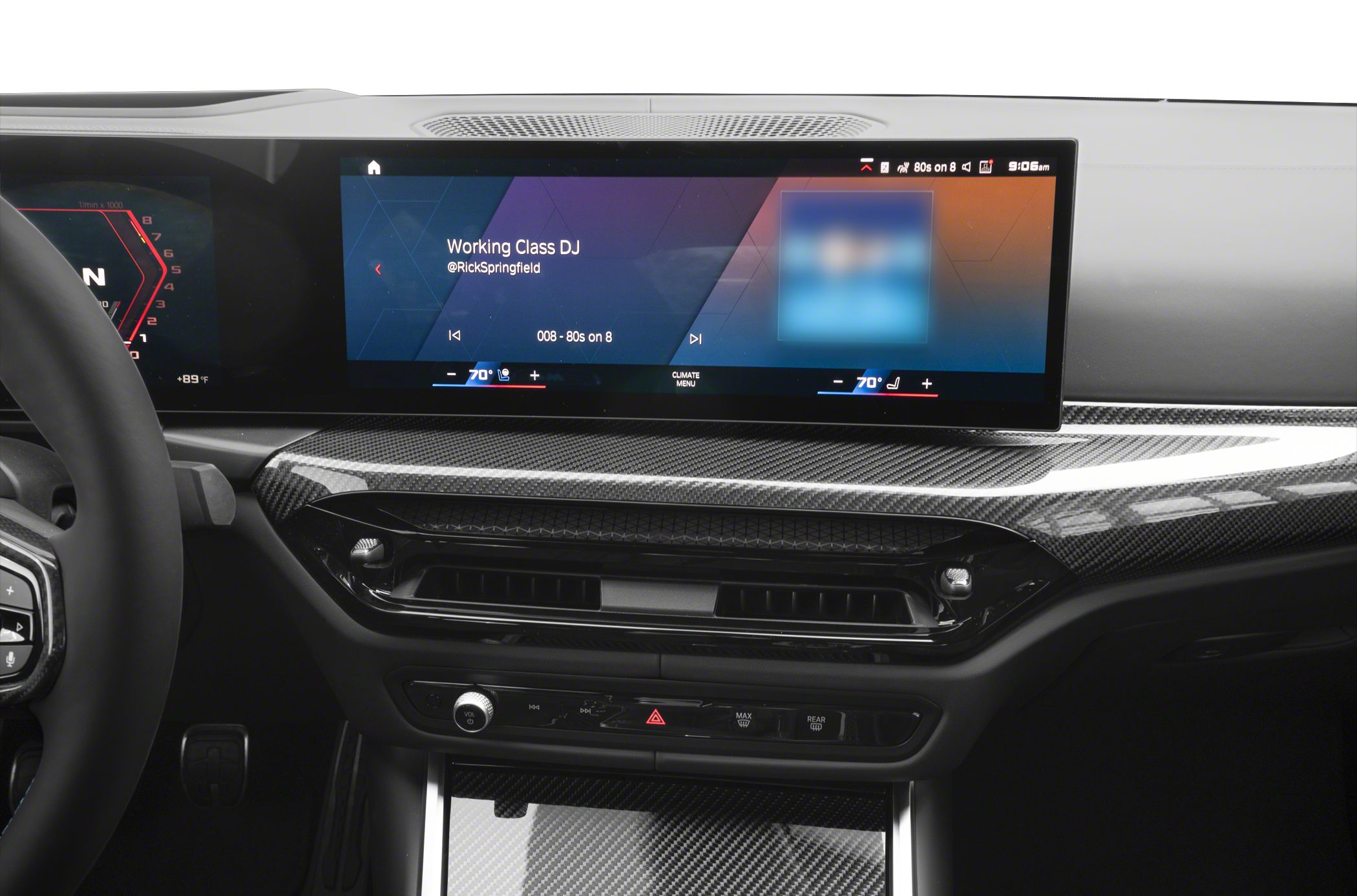 Digital dashboard and infotainment display with carbon fiber trim in modern luxury car interior