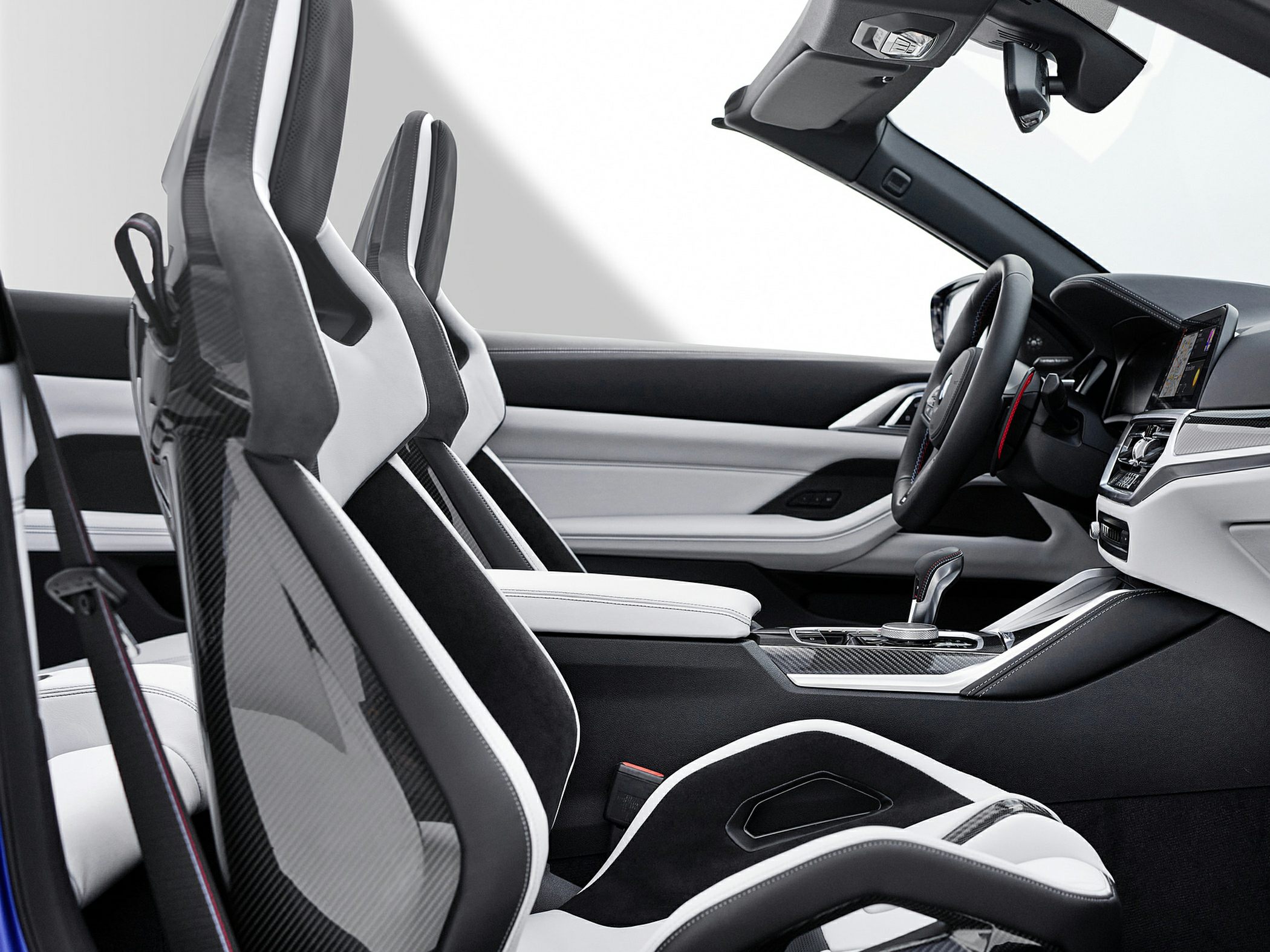 Carbon fiber sports seats and modern dashboard interior