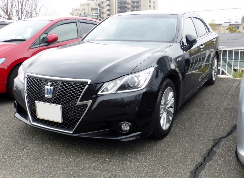 Luxury sedan with bold front grille and modern LED headlights