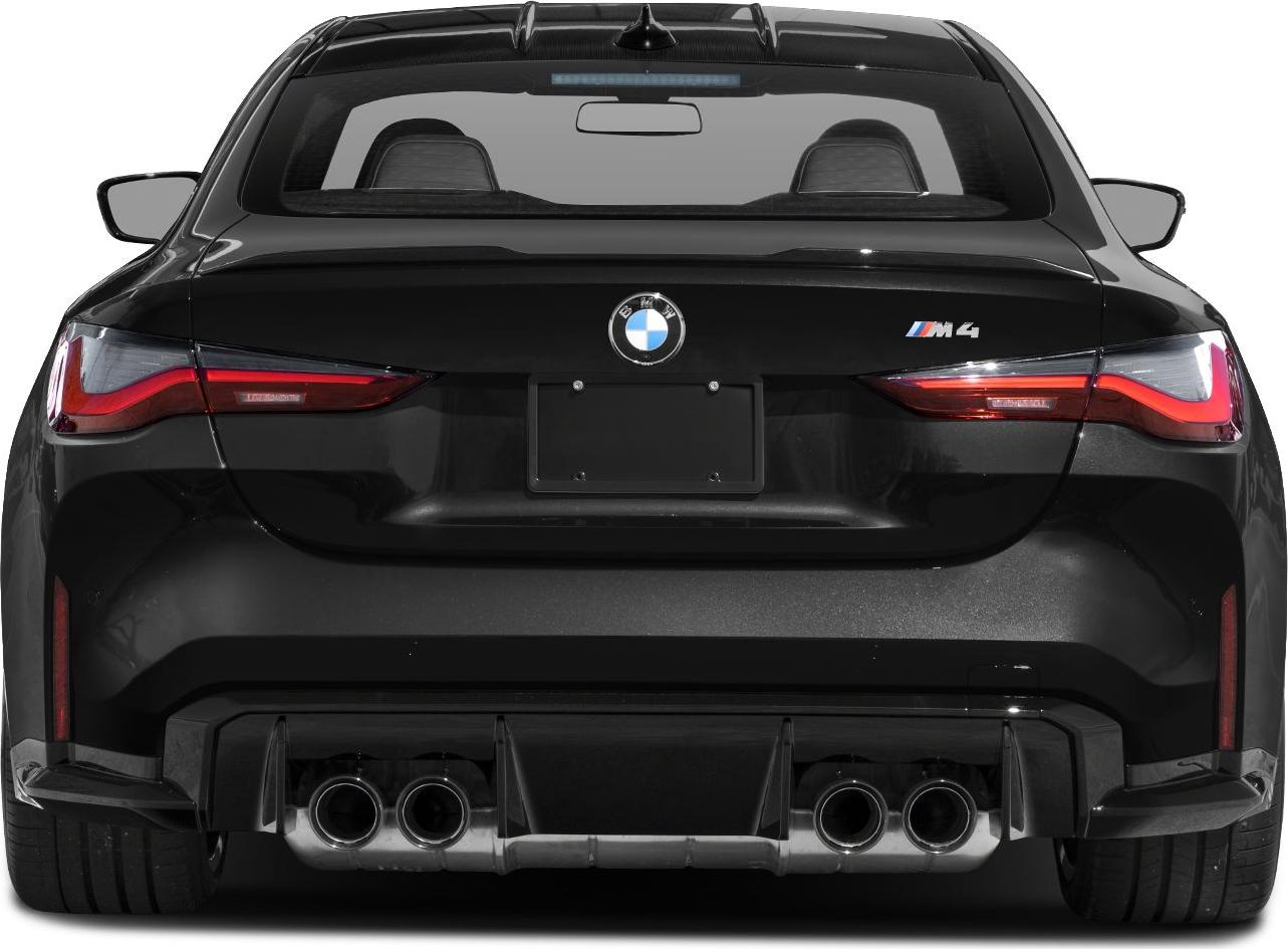 Quad exhaust pipes and LED tail lights at rear.