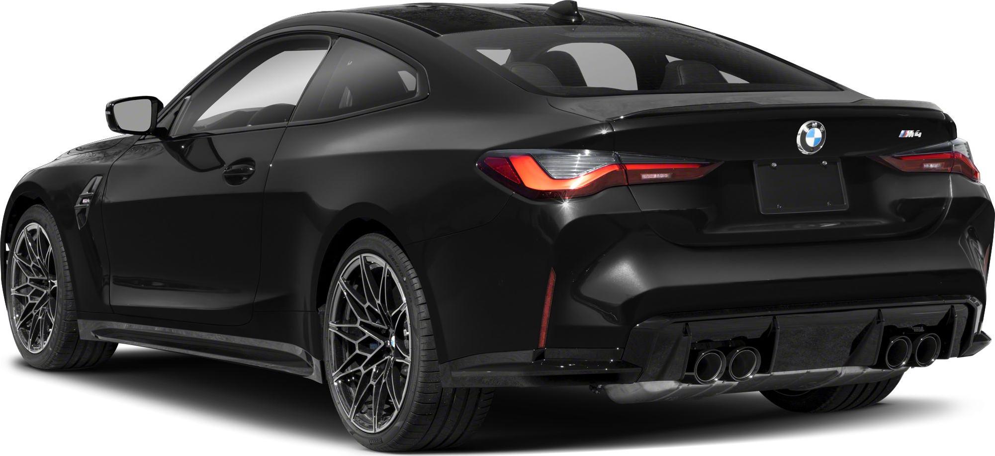 Rear view with quad exhaust tips and sporty alloy wheels