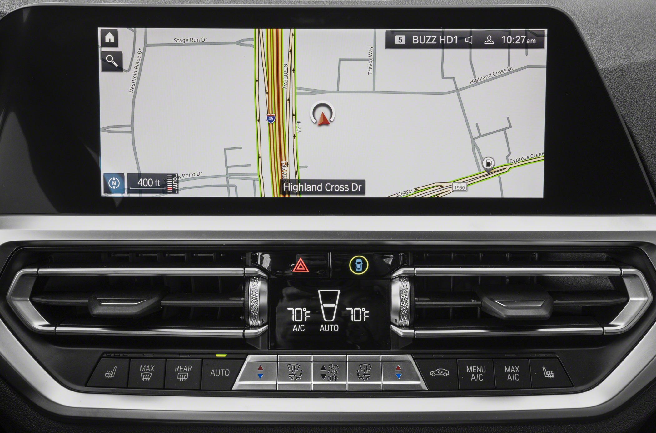 Car infotainment navigation screen and dual-zone climate control panel with air vents