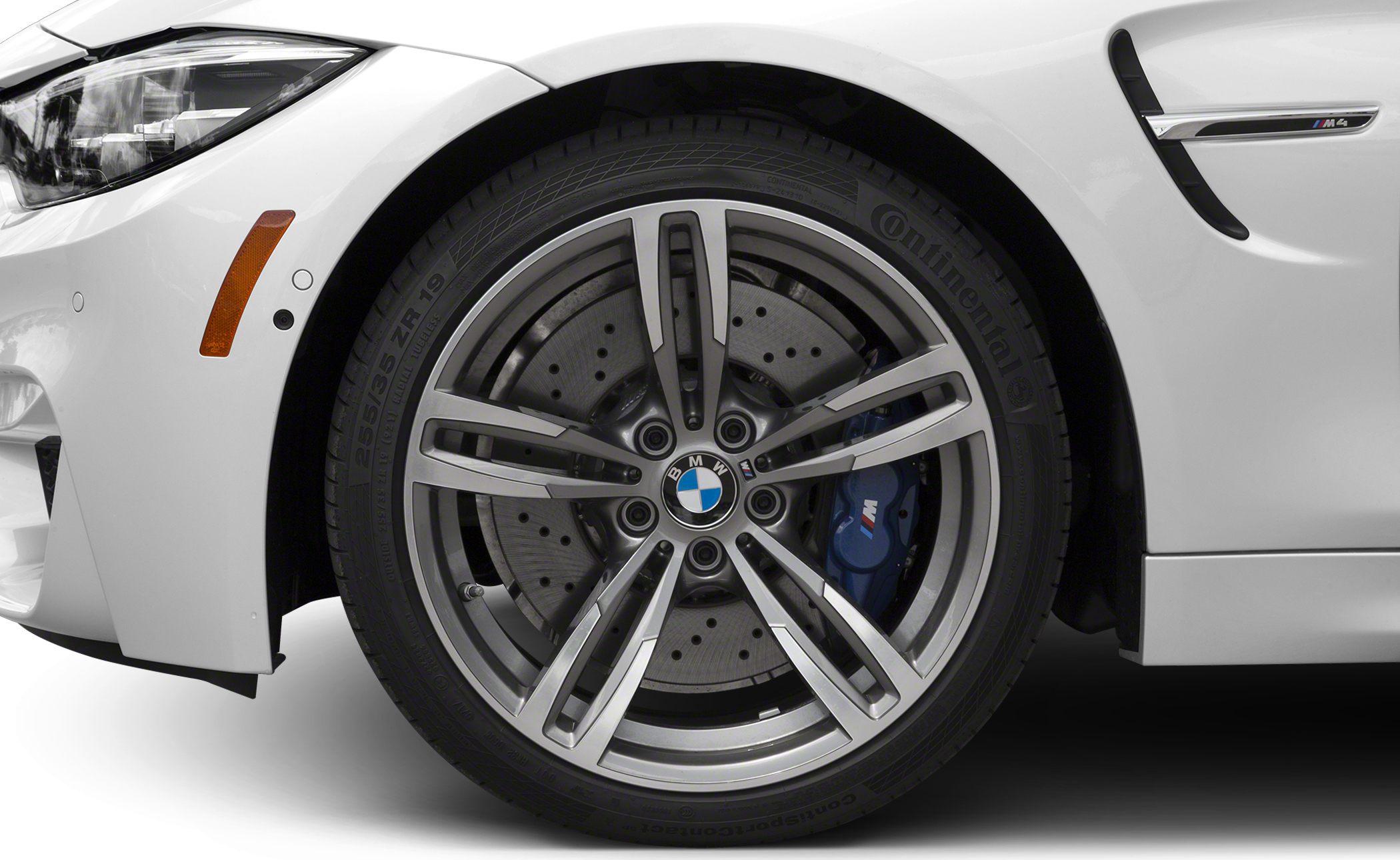 Close-up of alloy wheel and brake caliper