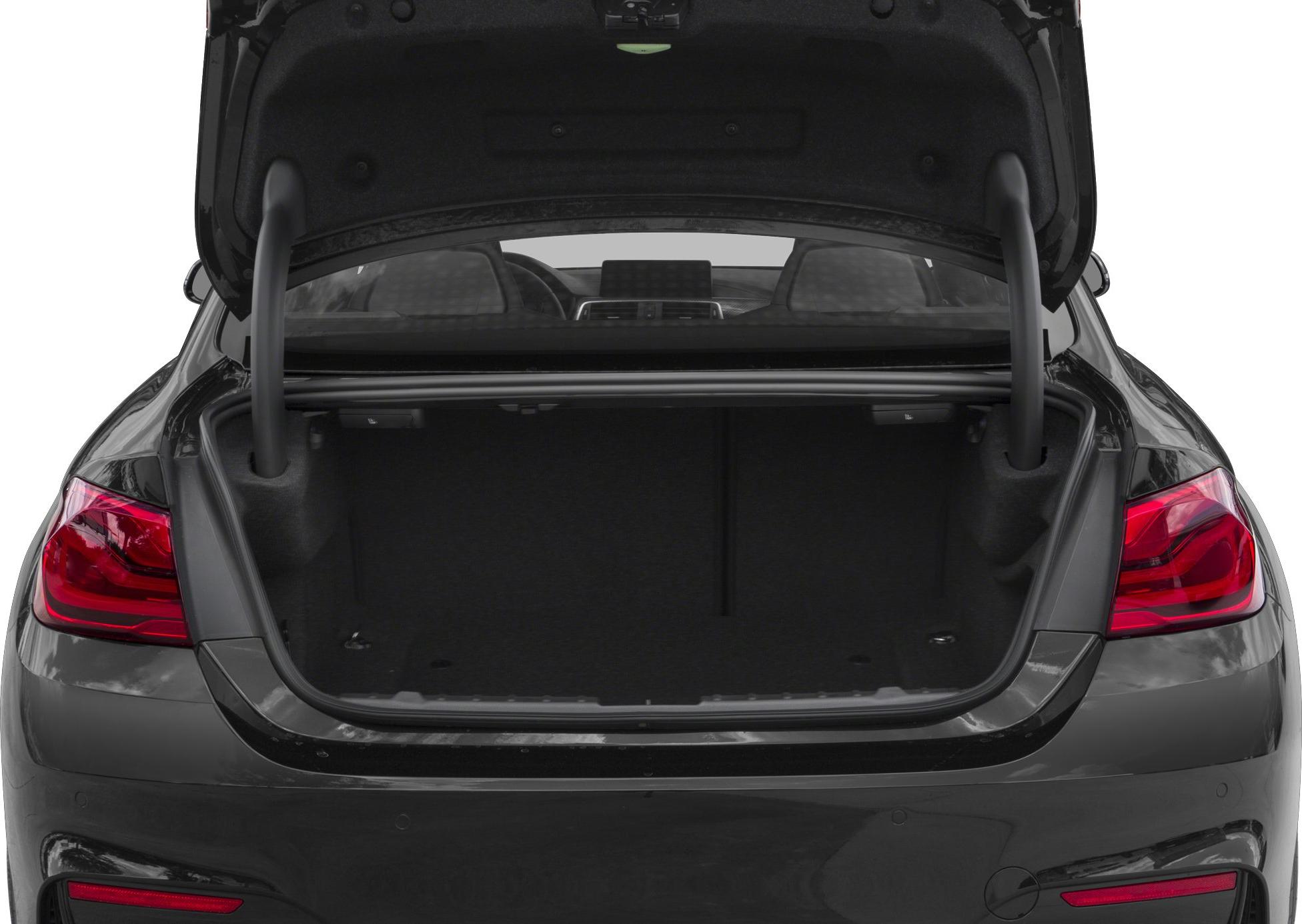 Open rear trunk with spacious cargo area and visible rear seats