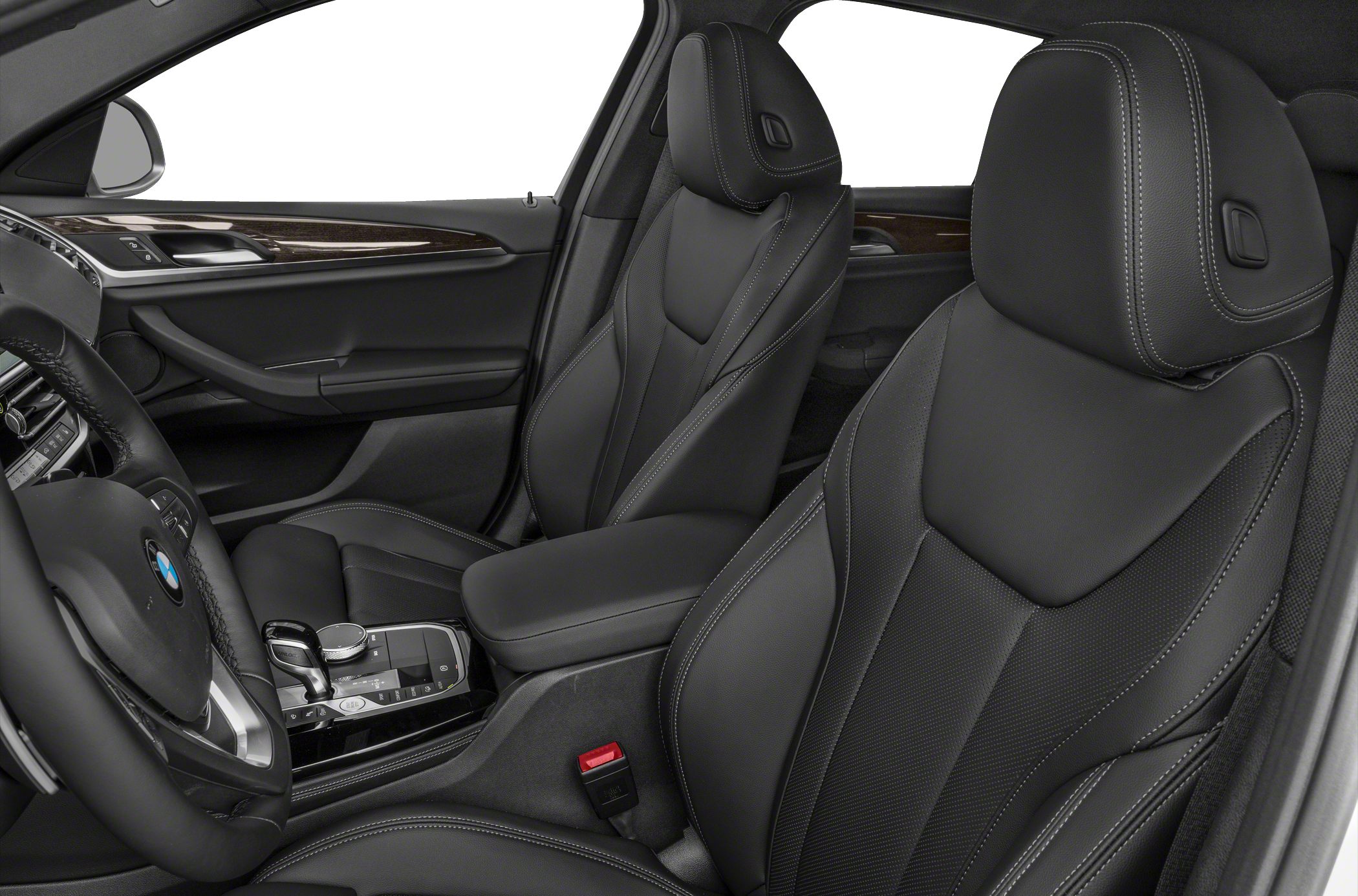 Black leather seats with white stitching and modern center console.