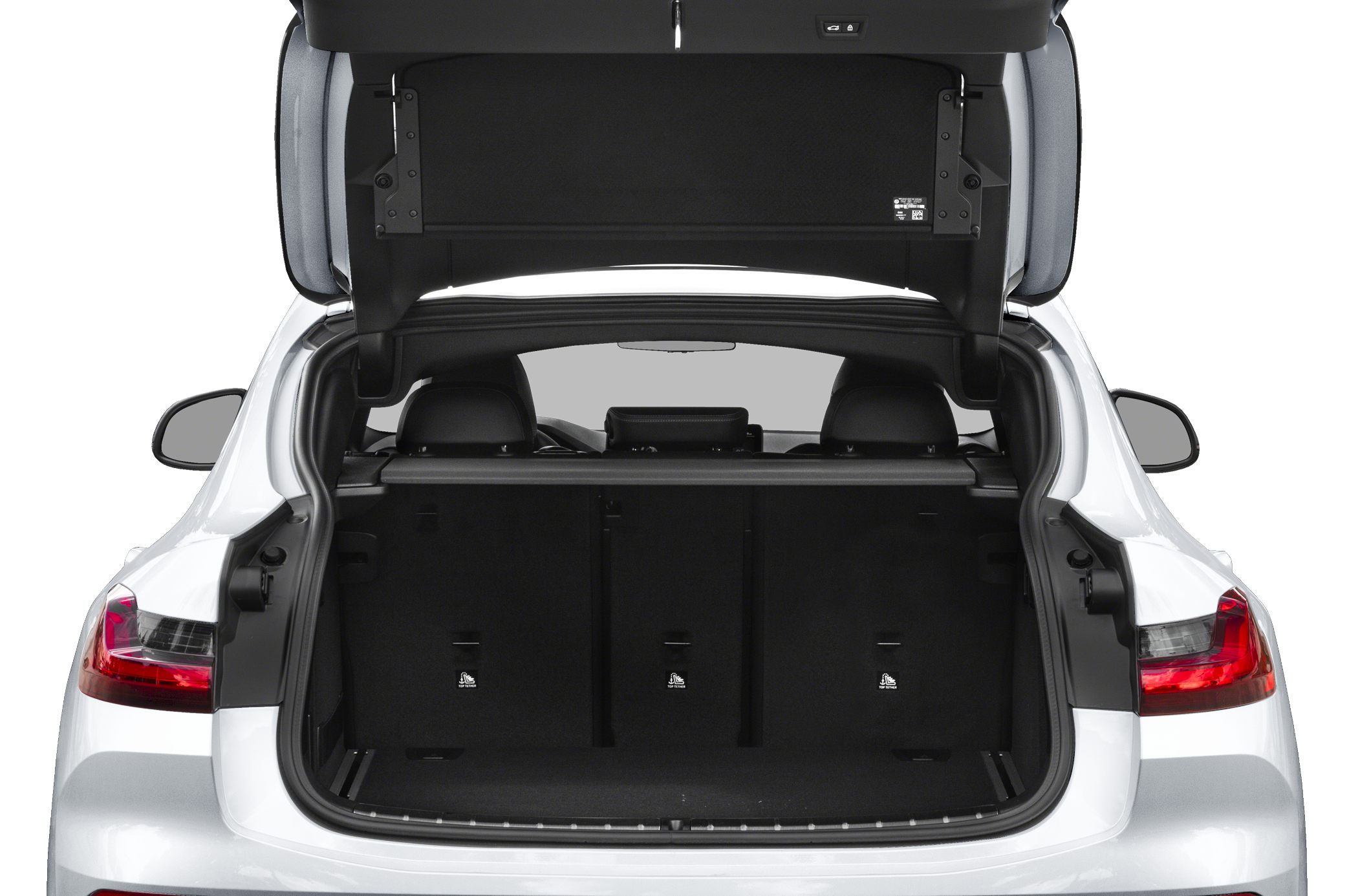 Open rear cargo trunk with spacious storage and split-fold rear seats.