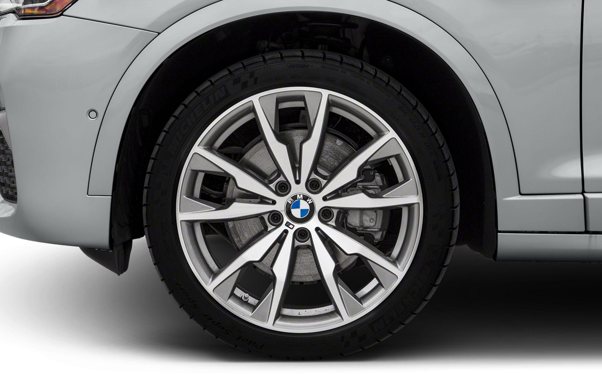 Close-up of alloy wheel and tire with visible brake disc and caliper
