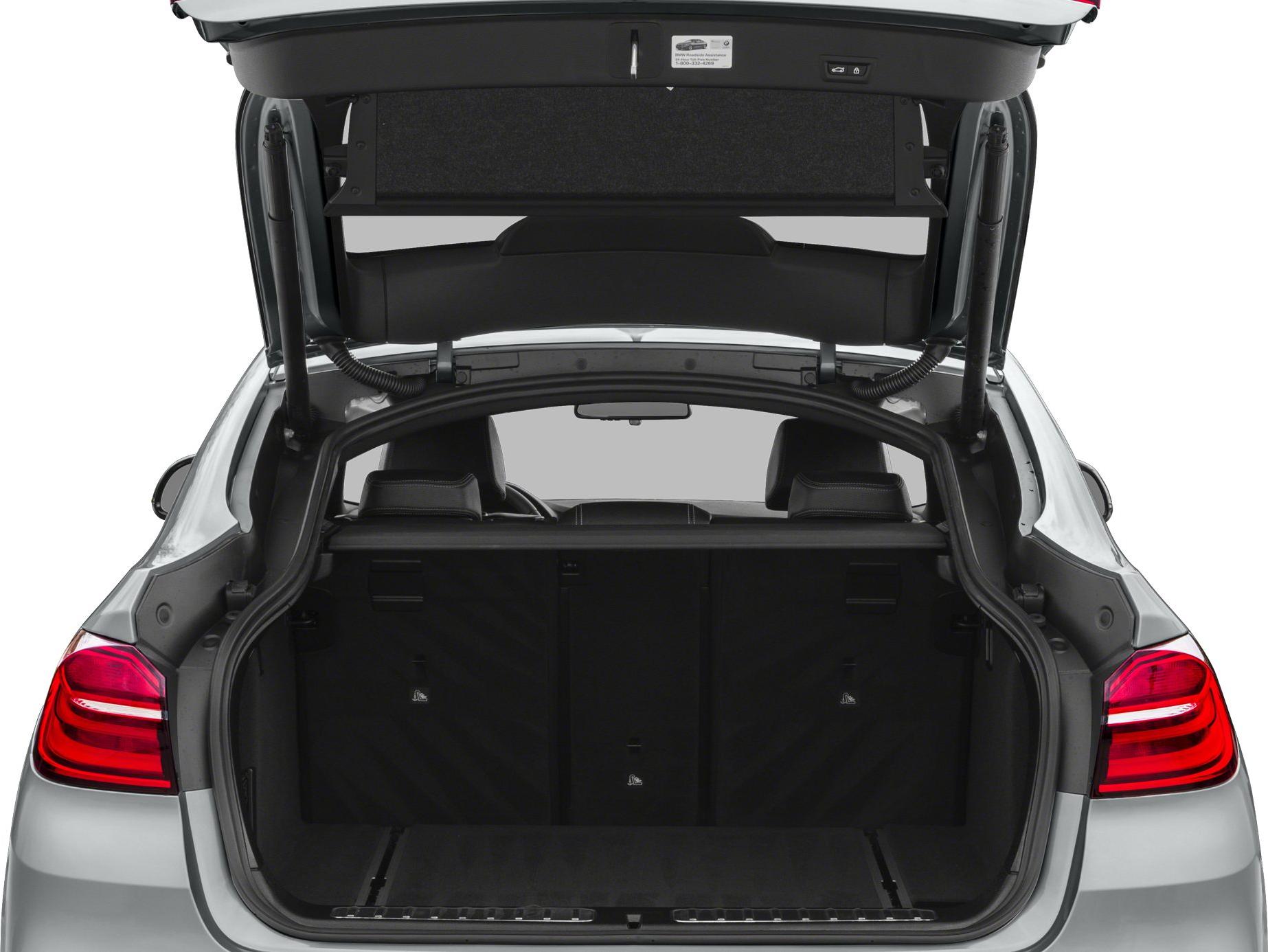 Open rear cargo area with hatchback and back seats visible