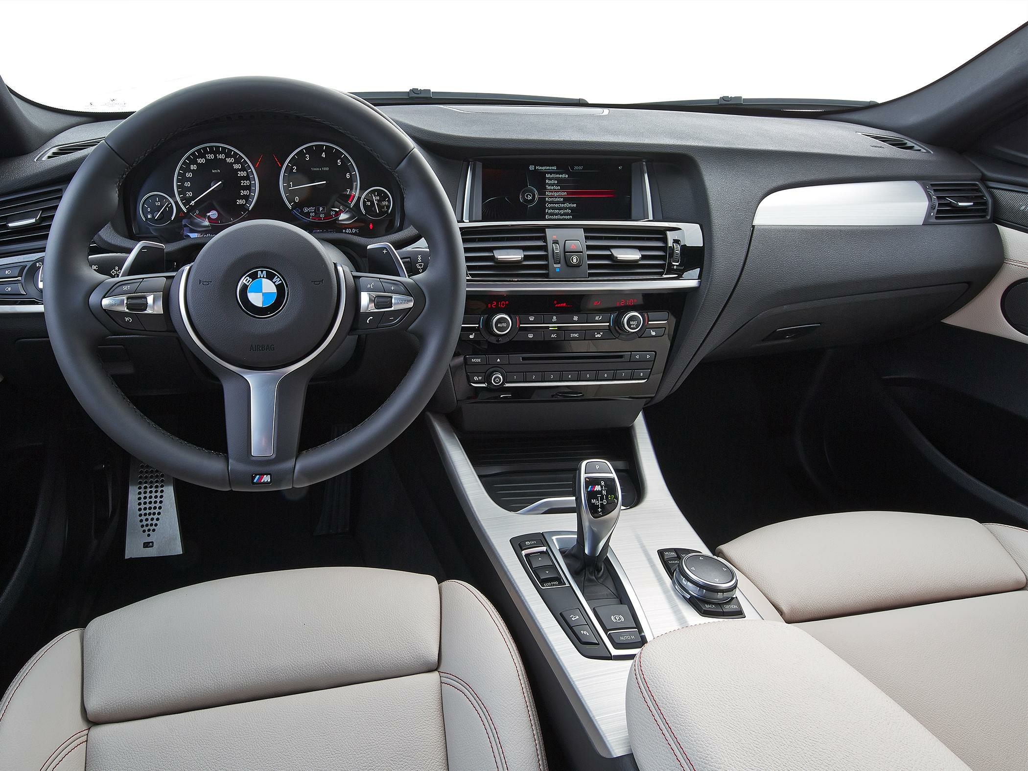 Steering wheel, dashboard, and center console with gear lever