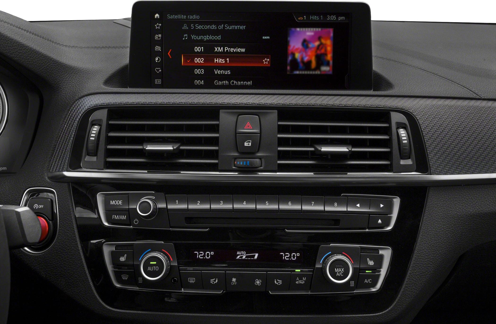 Dashboard with infotainment screen, air vents, and climate controls