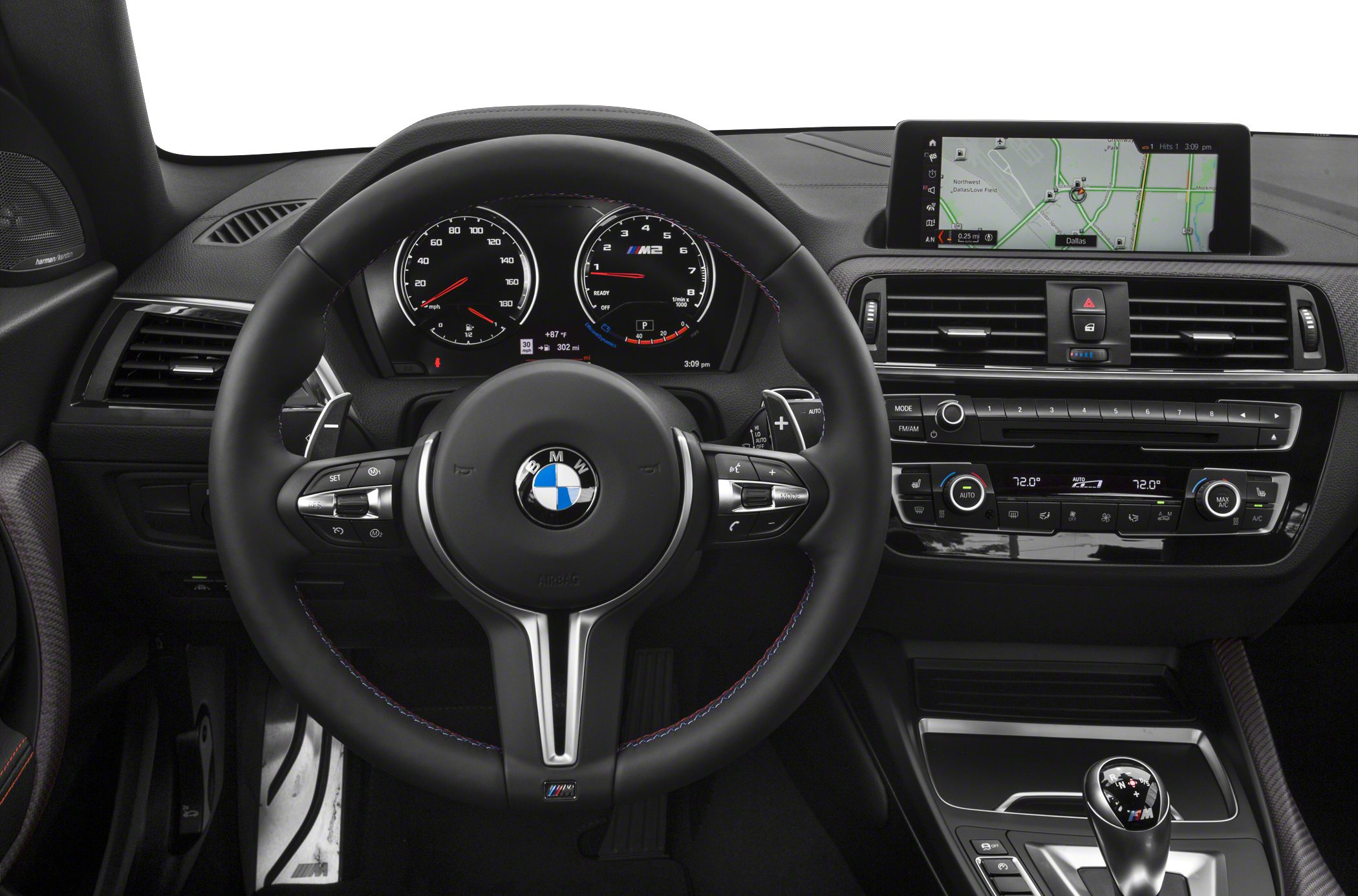 Dashboard and steering wheel with digital gauges and infotainment screen
