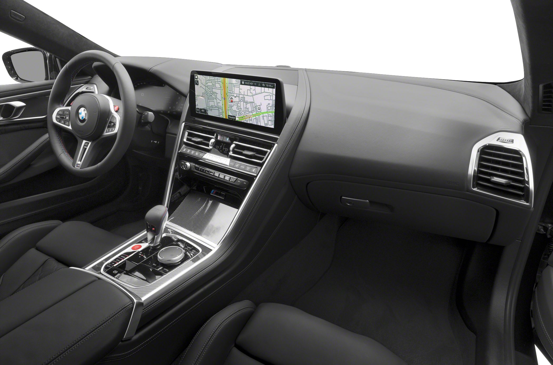 Modern digital cockpit and carbon fiber trim in luxury convertible interior