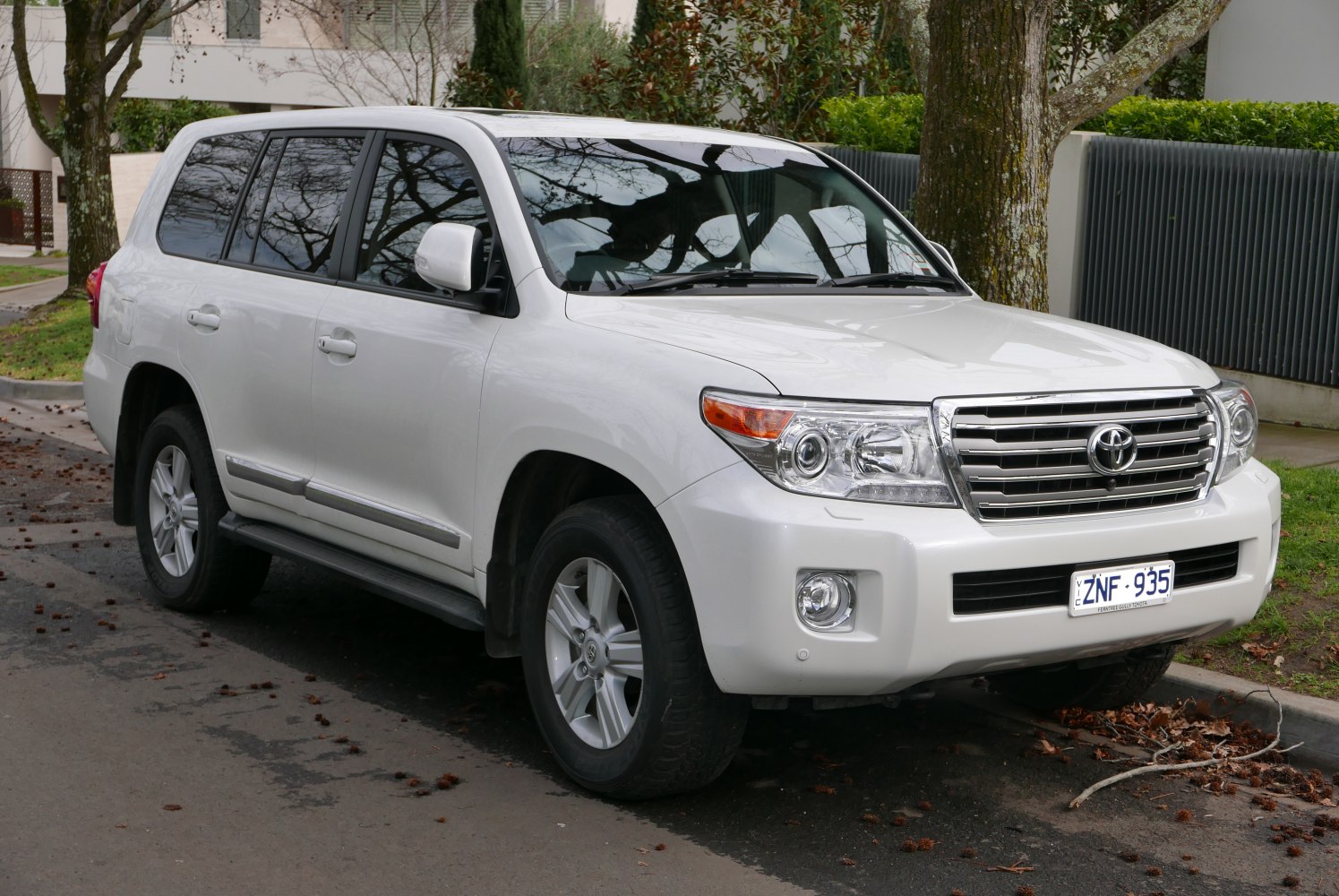 White SUV with front-angle view showing grille and headlight design
