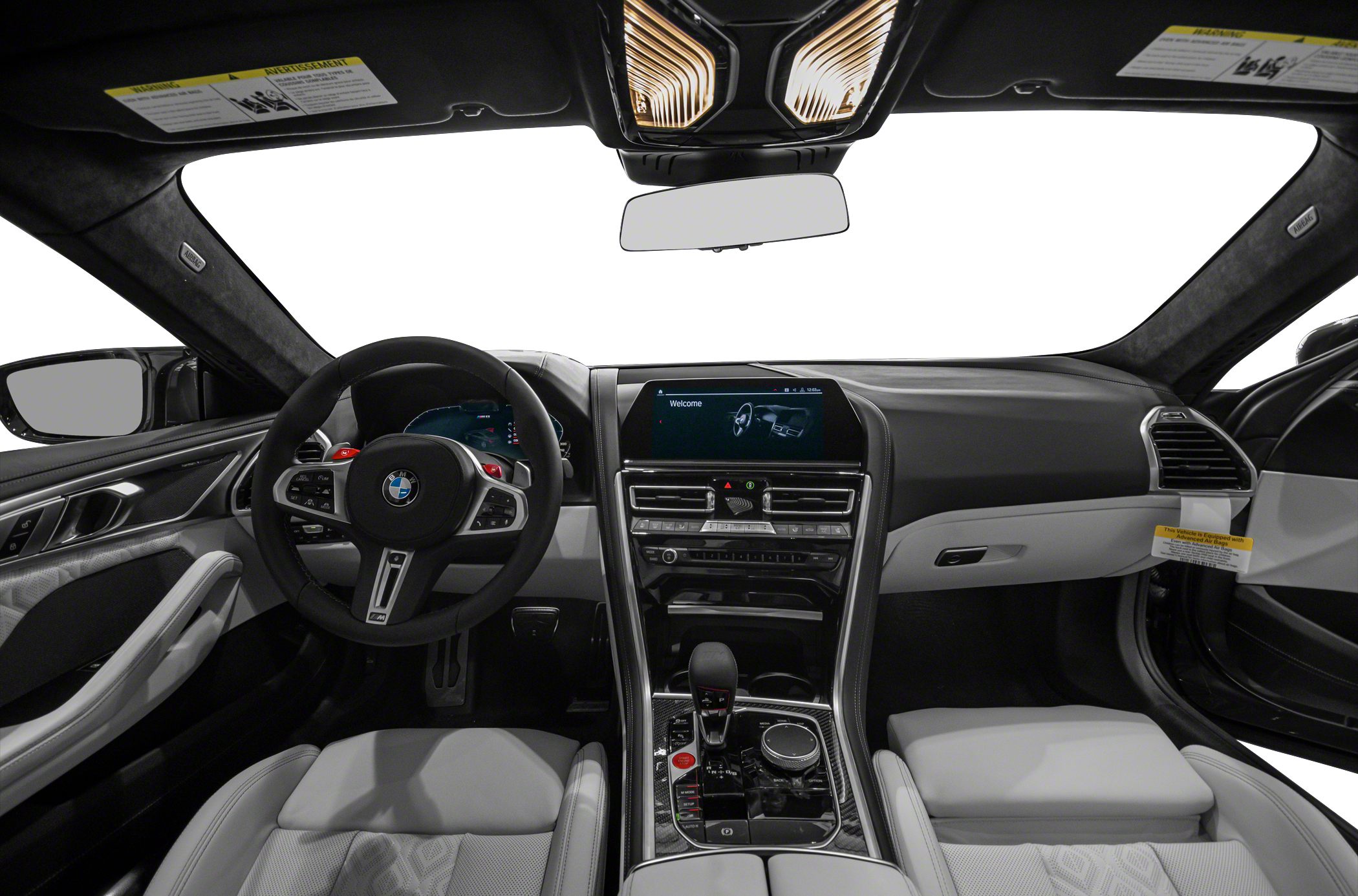 High-tech dashboard and sporty steering wheel in luxury coupe interior
