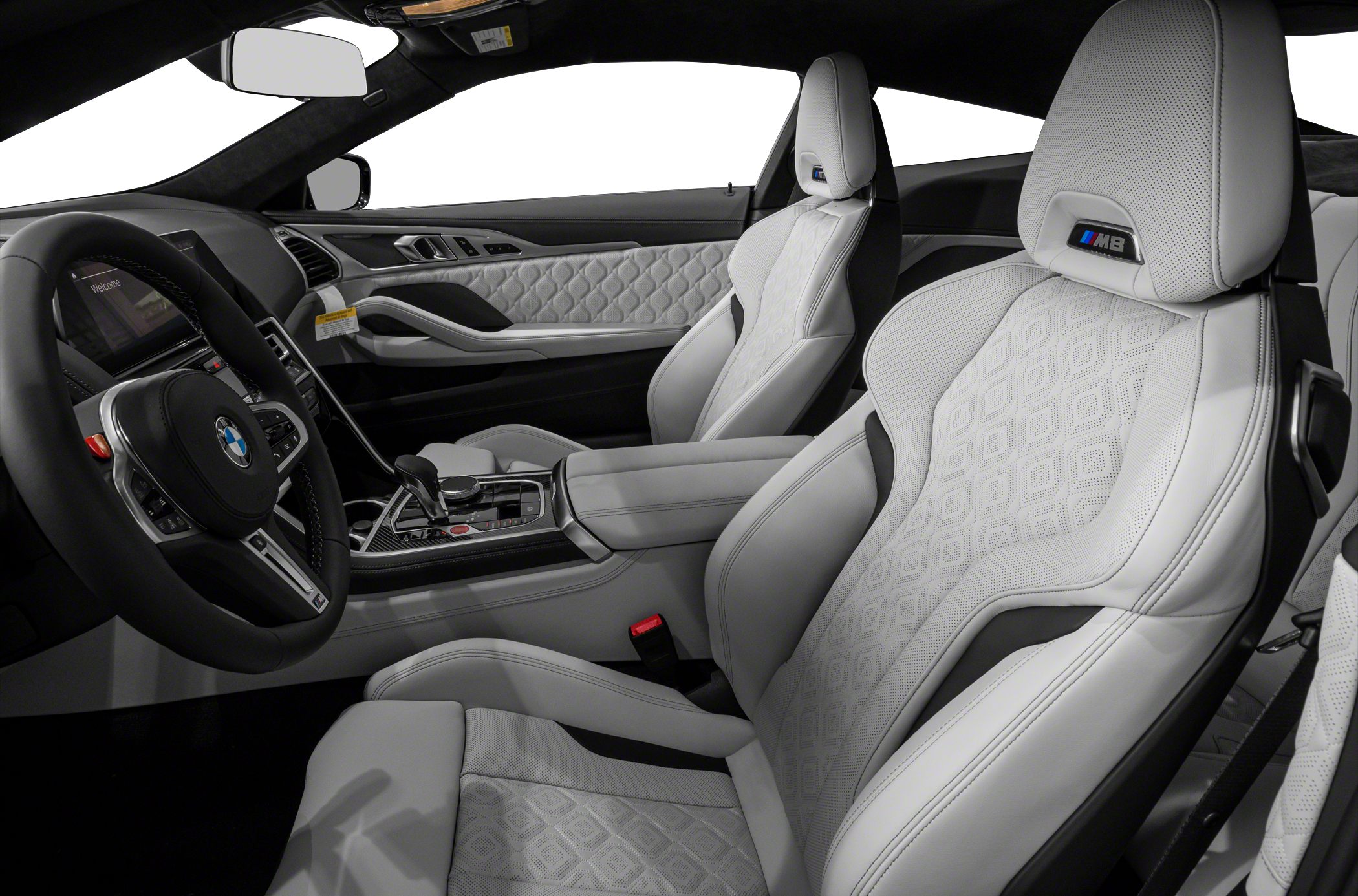 White quilted leather seats with M8 embossing and modern steering wheel