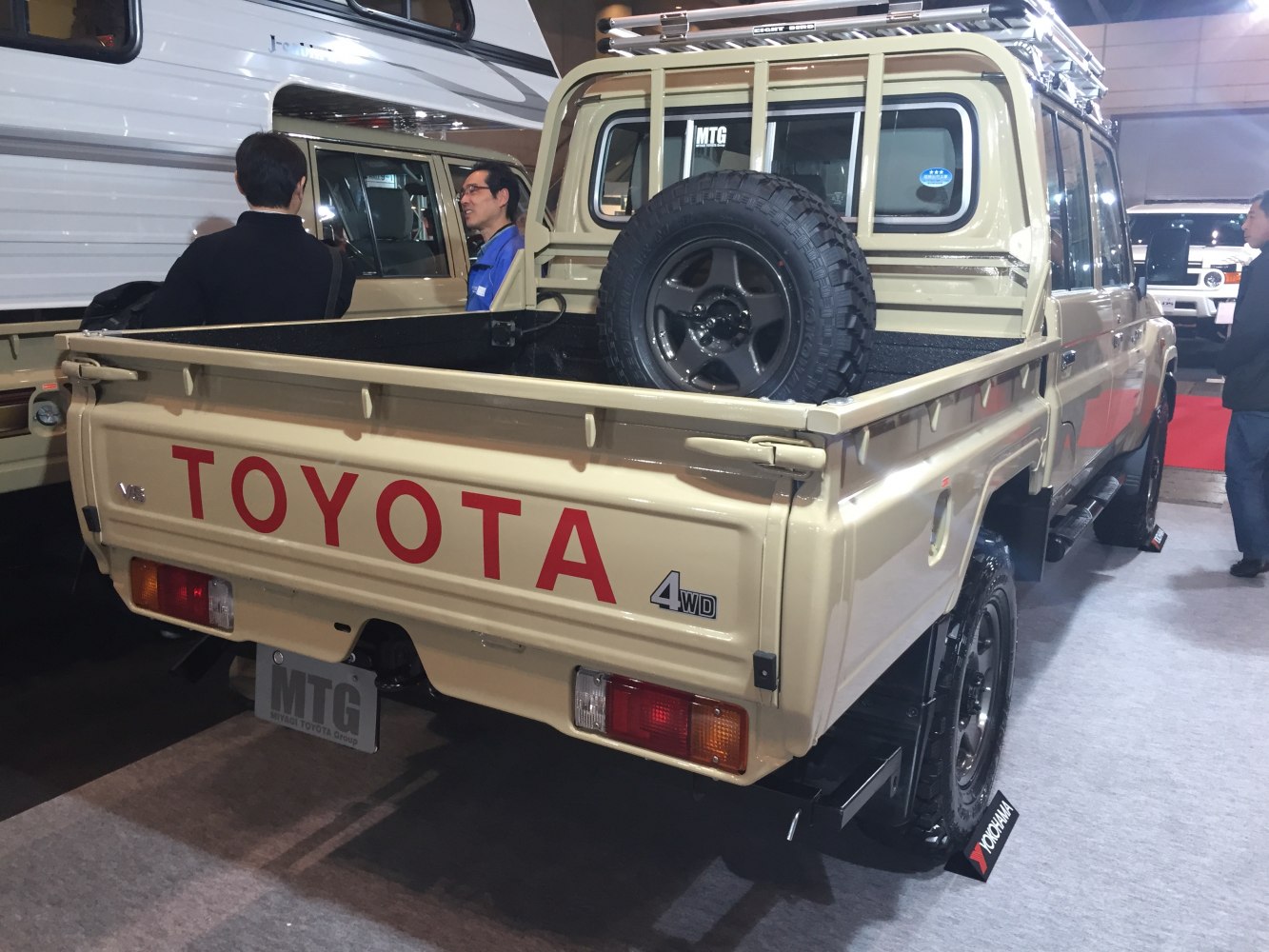 Pickup rear with spare tire and 4WD badge