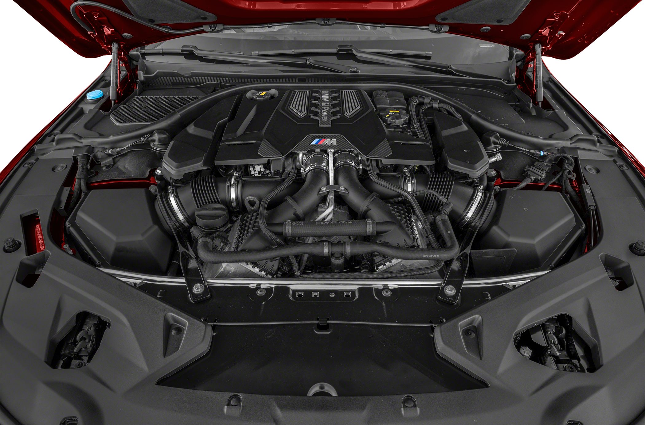 BMW engine bay with M Power branding and complex intake system