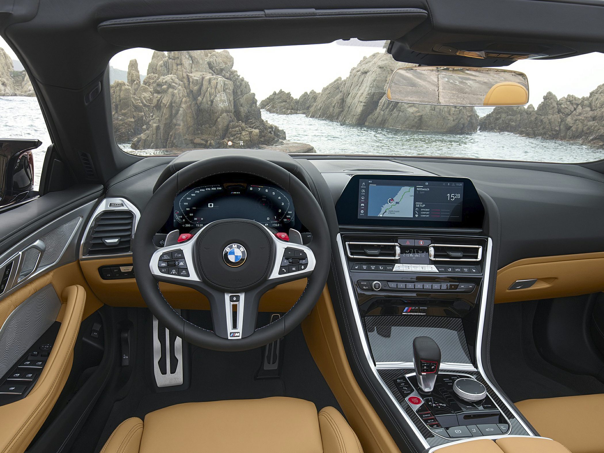 Digital dashboard and sporty steering wheel with premium interior materials