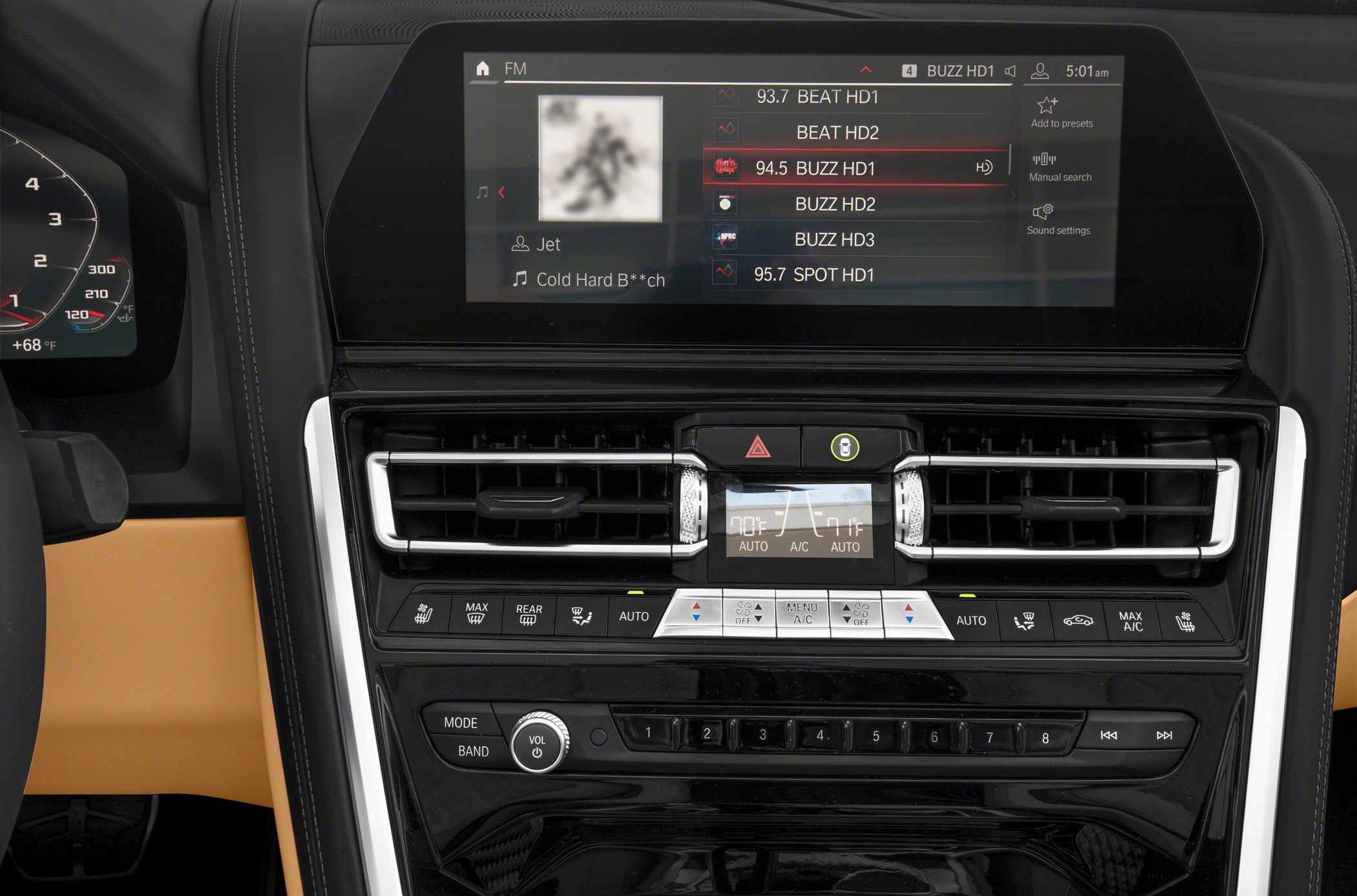 Digital climate control and modern infotainment system on luxury car dashboard
