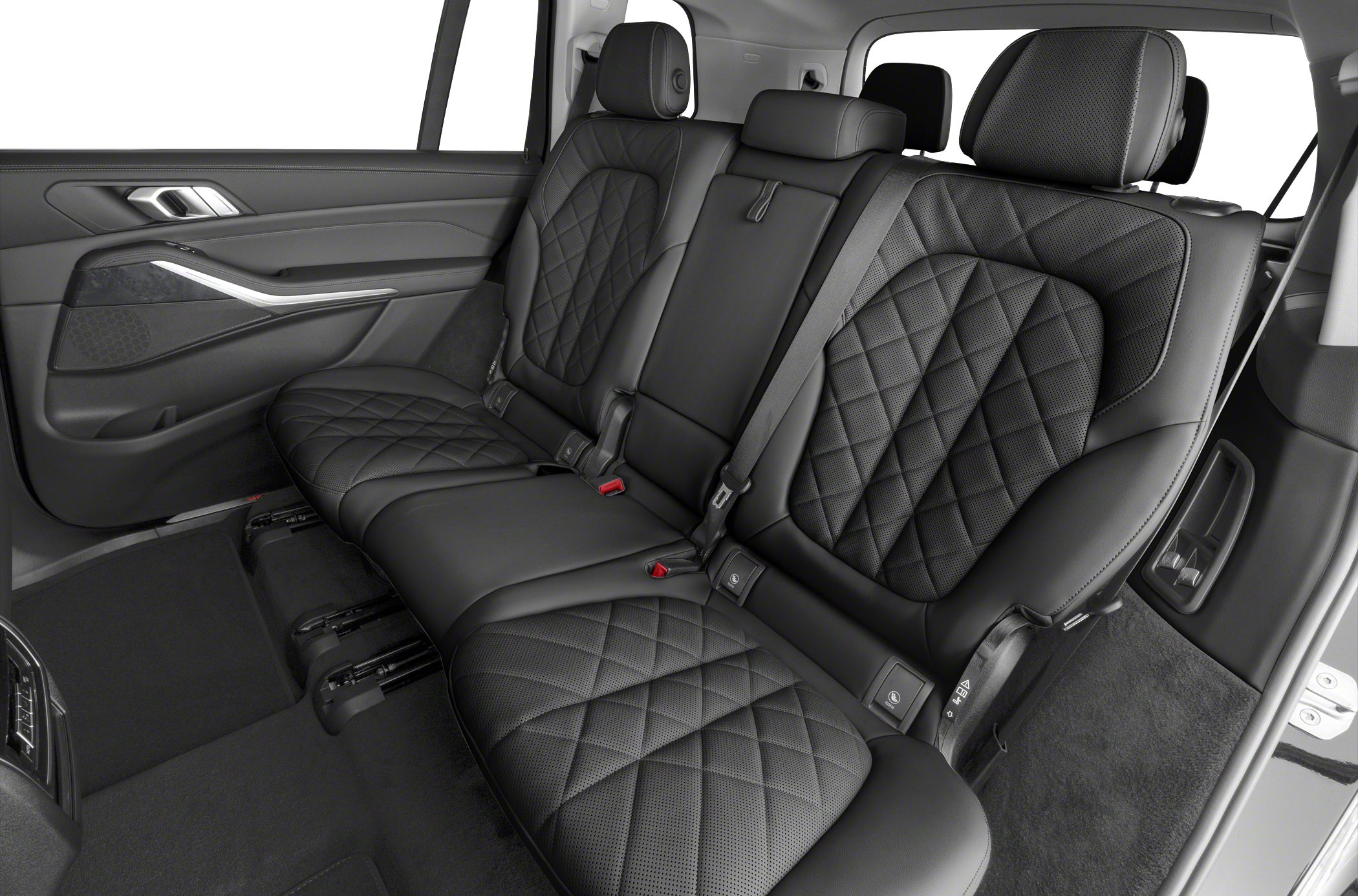 Luxurious rear seat with quilted leather upholstery and integrated seatbelts