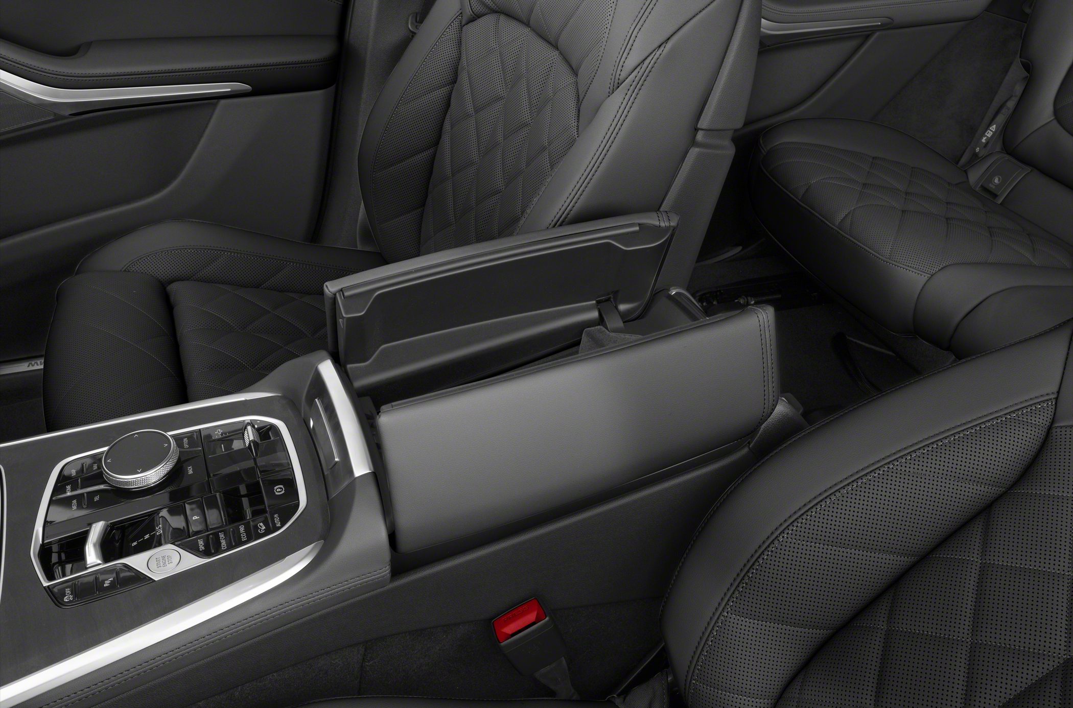 Quilted leather seats and advanced center console with control buttons and armrest storage