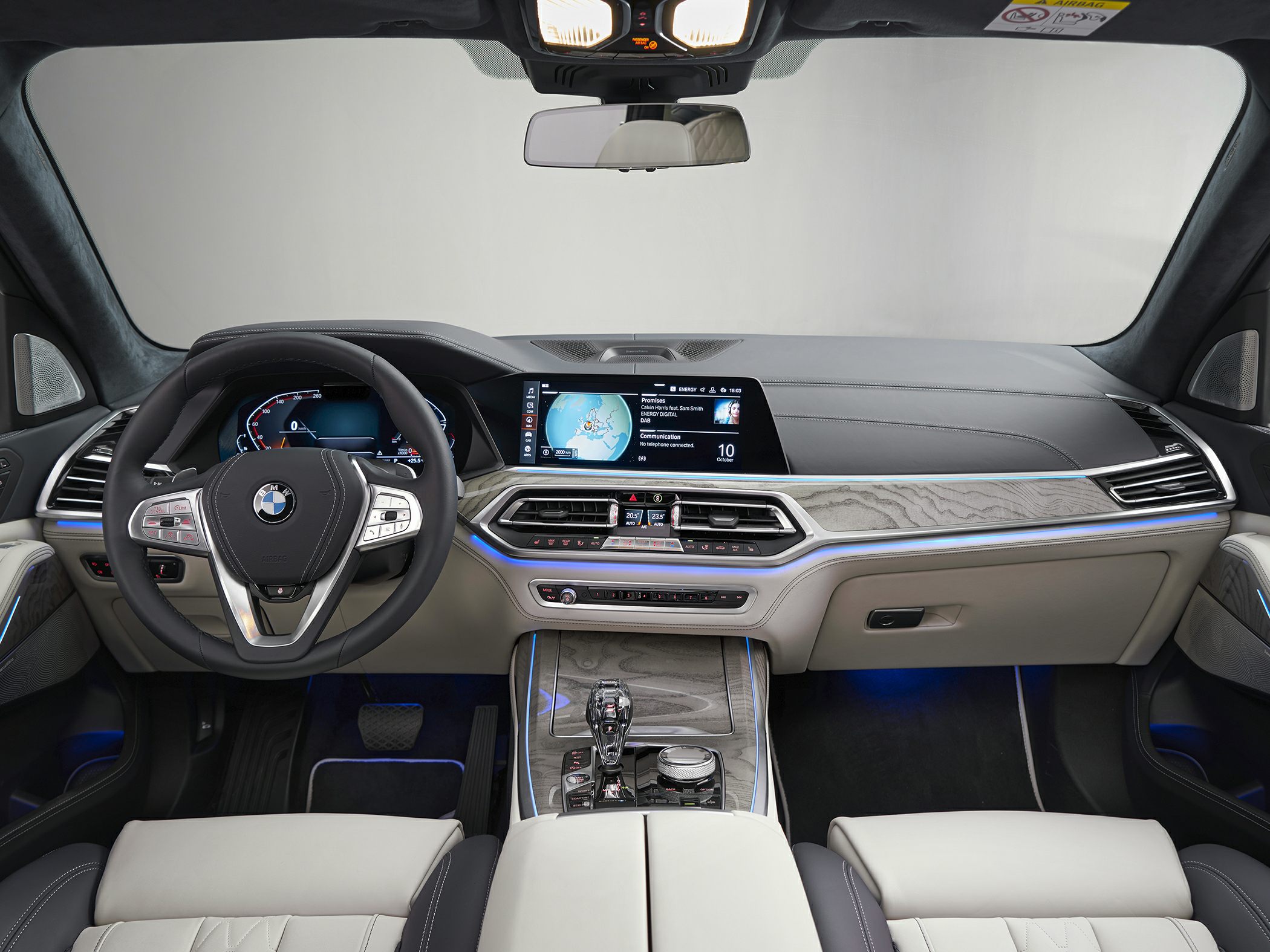 Luxury SUV interior with digital dashboard and ambient lighting