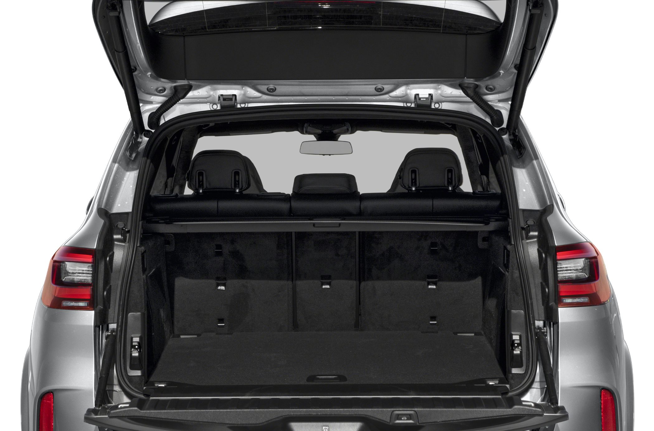 Open cargo area with rear seats and tailgate of an SUV