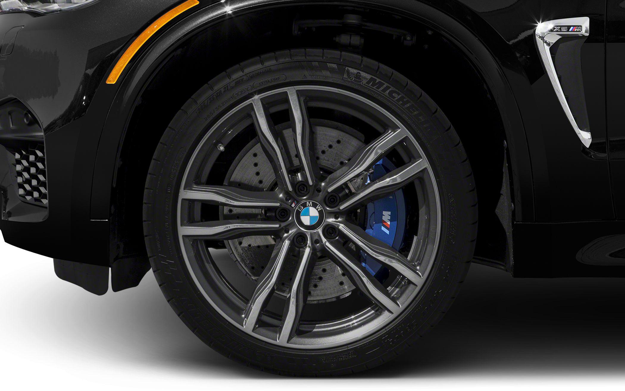 Multi-spoke alloy wheel with blue performance brake caliper