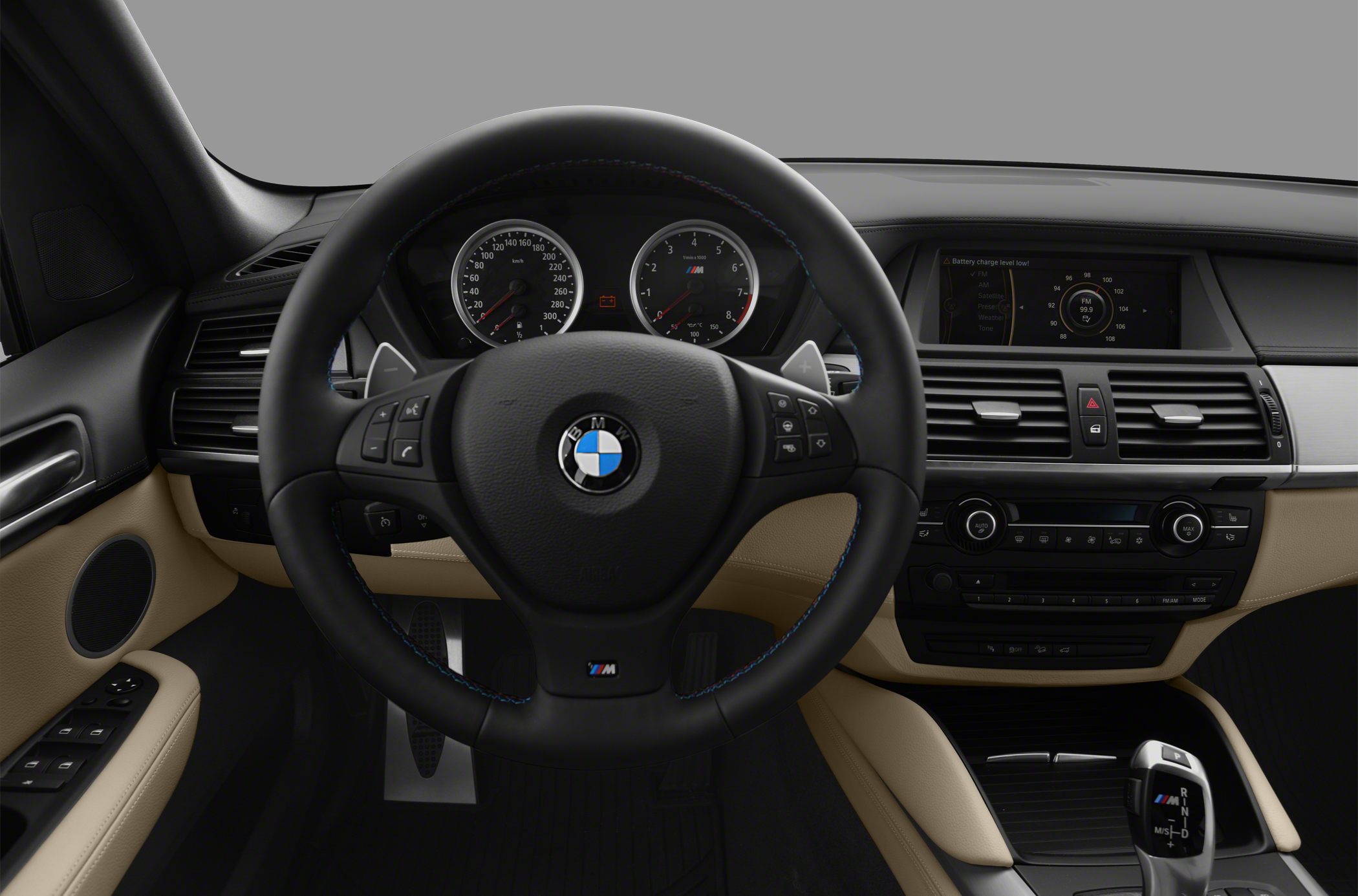 Steering wheel and dashboard with instrument cluster and infotainment display