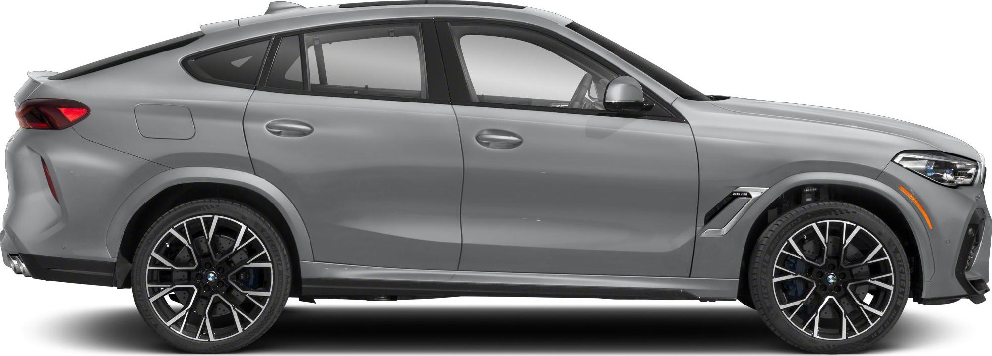 Side profile of a coupe SUV with detailed alloy wheels and drilled brake discs