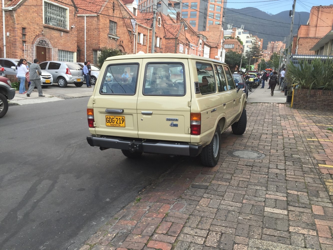 Rear view of boxy wagon with 4WD badge and dual rear windows