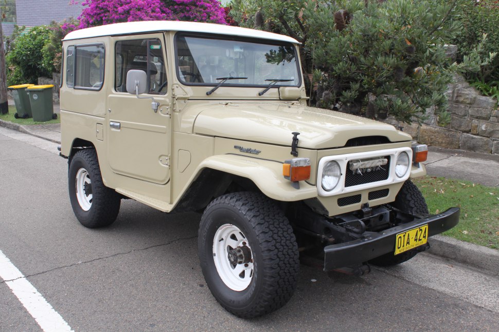 Rugged vintage off-road SUV with hard top and boxy shape