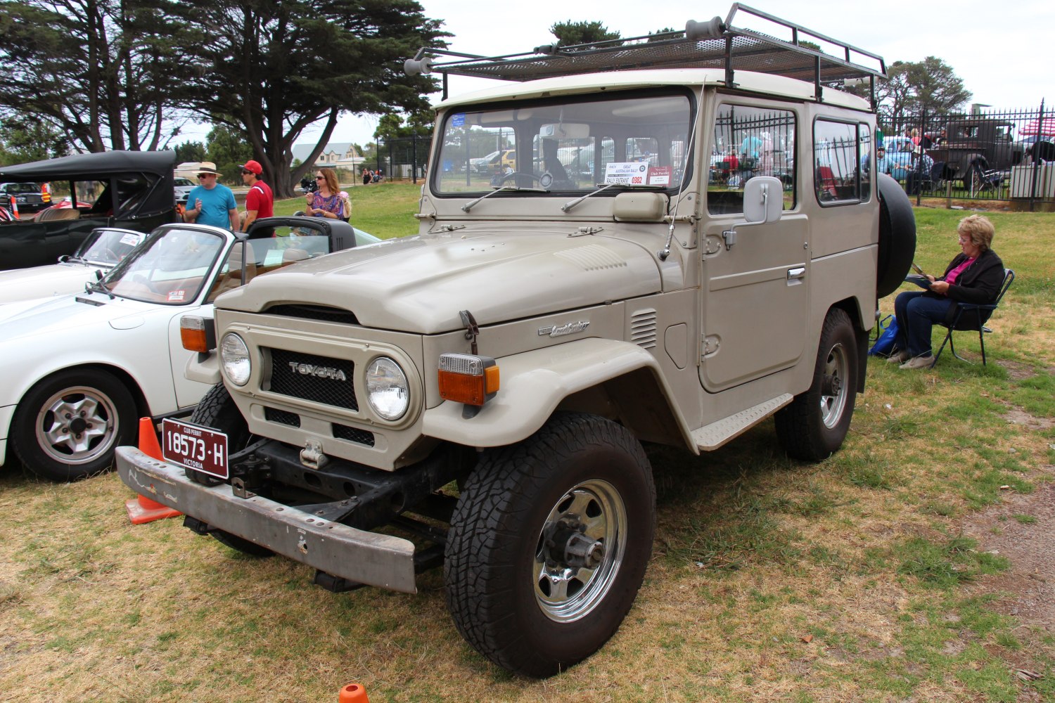 Rugged vintage off-road SUV with roof rack and hard top body