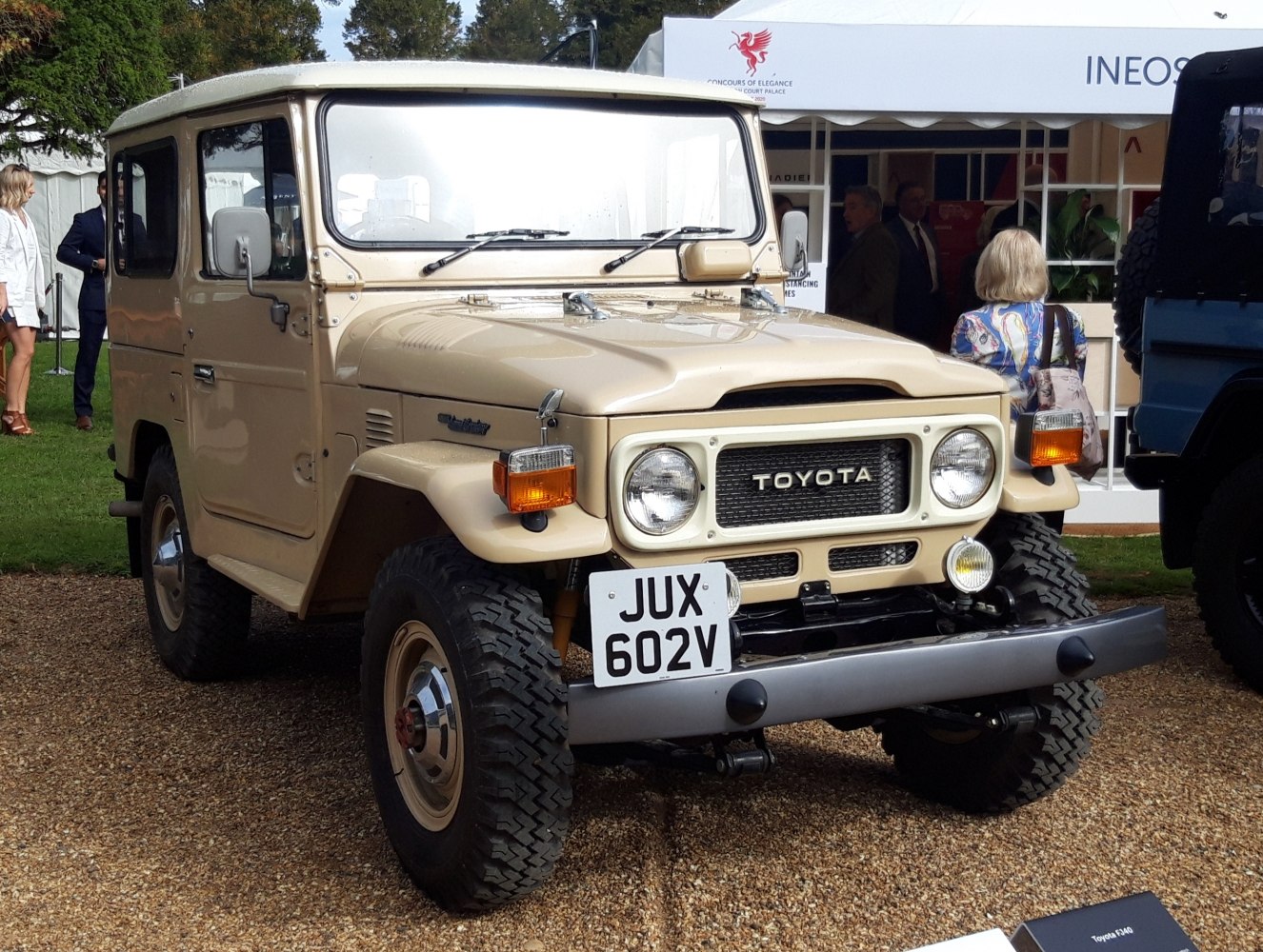 Boxy vintage off-road vehicle with round headlights and rugged tires