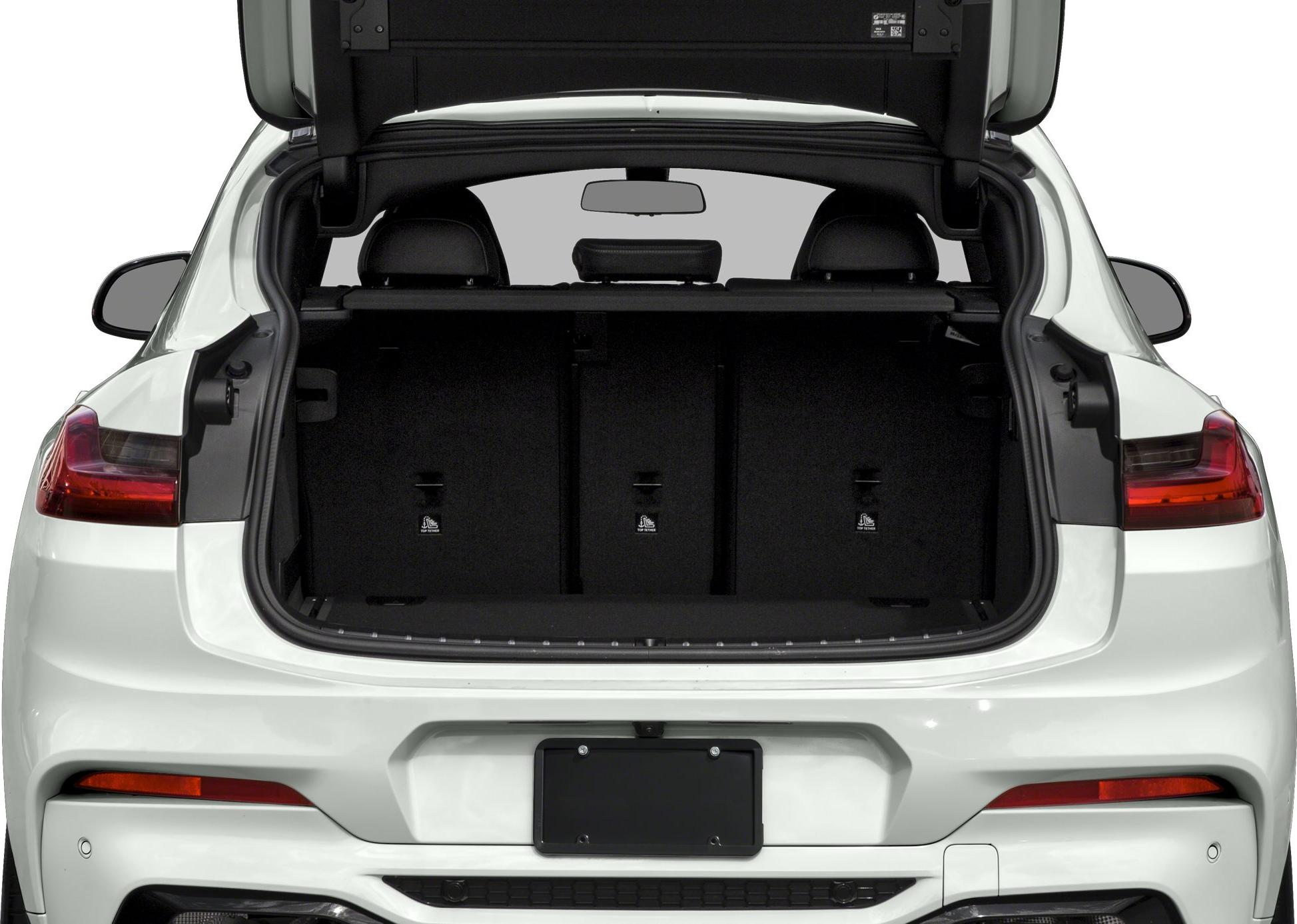 Open SUV trunk cargo space with rear tail lights
