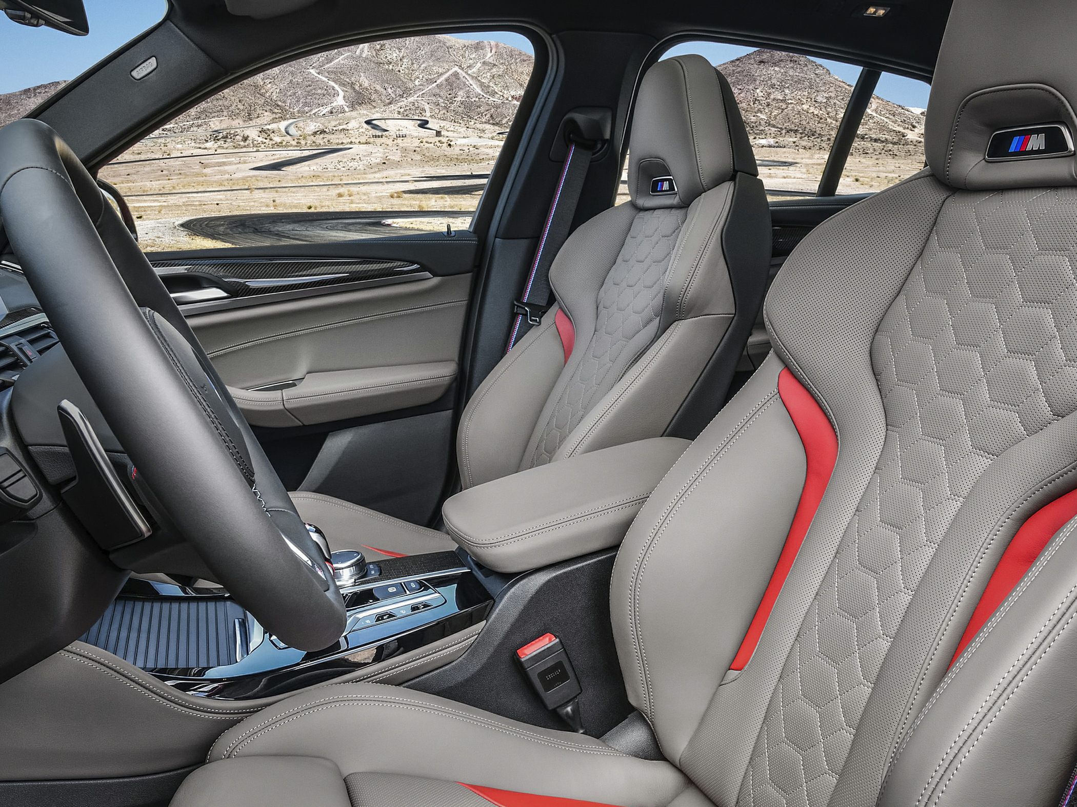 Sporty stitched interior seats with M logos and modern cabin design