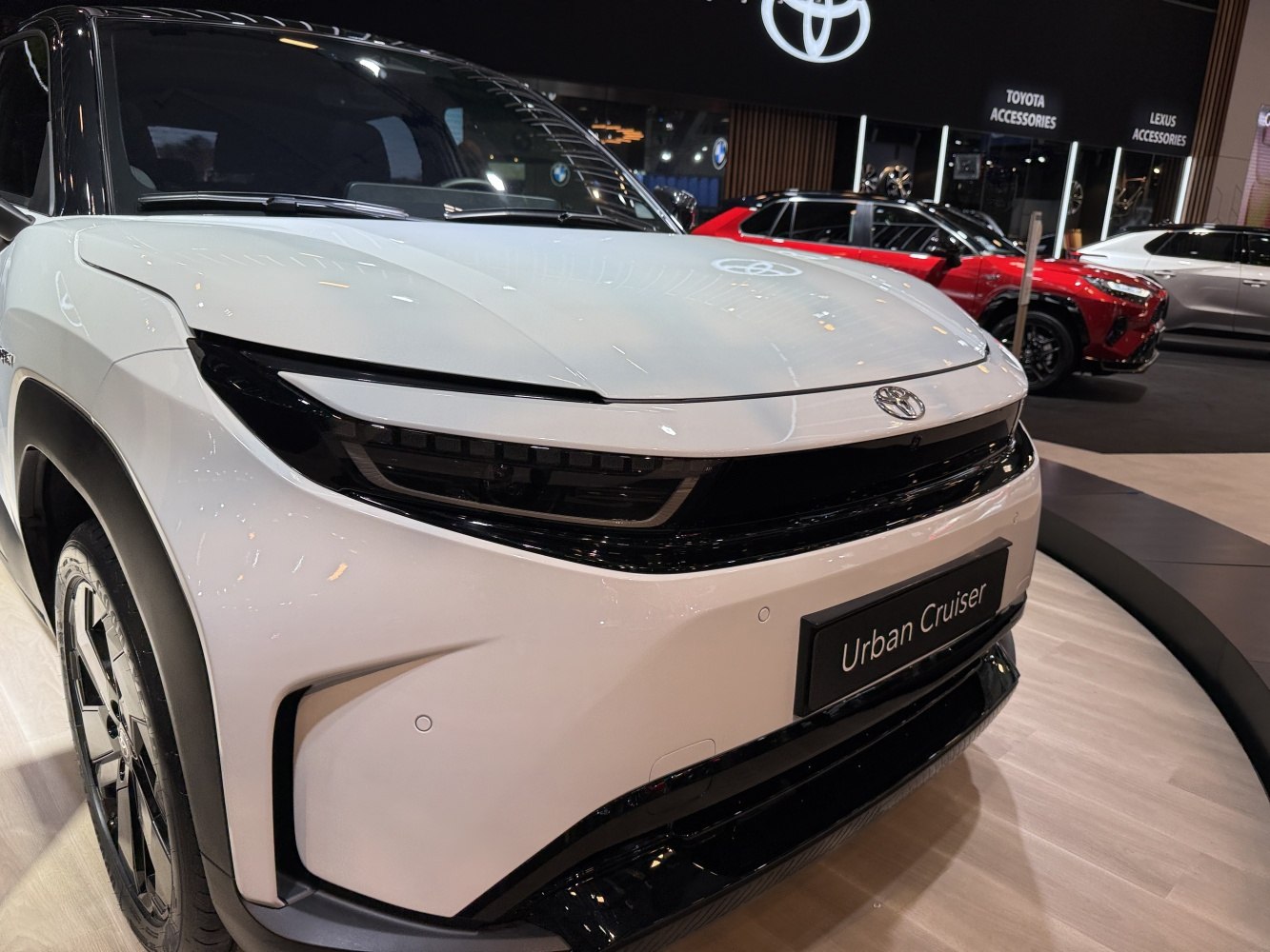 Close-up of front fascia with sleek headlights and black grille