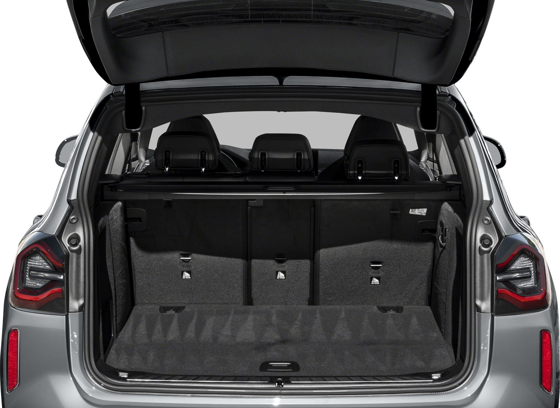 Open rear trunk with visible cargo space and rear seats in SUV
