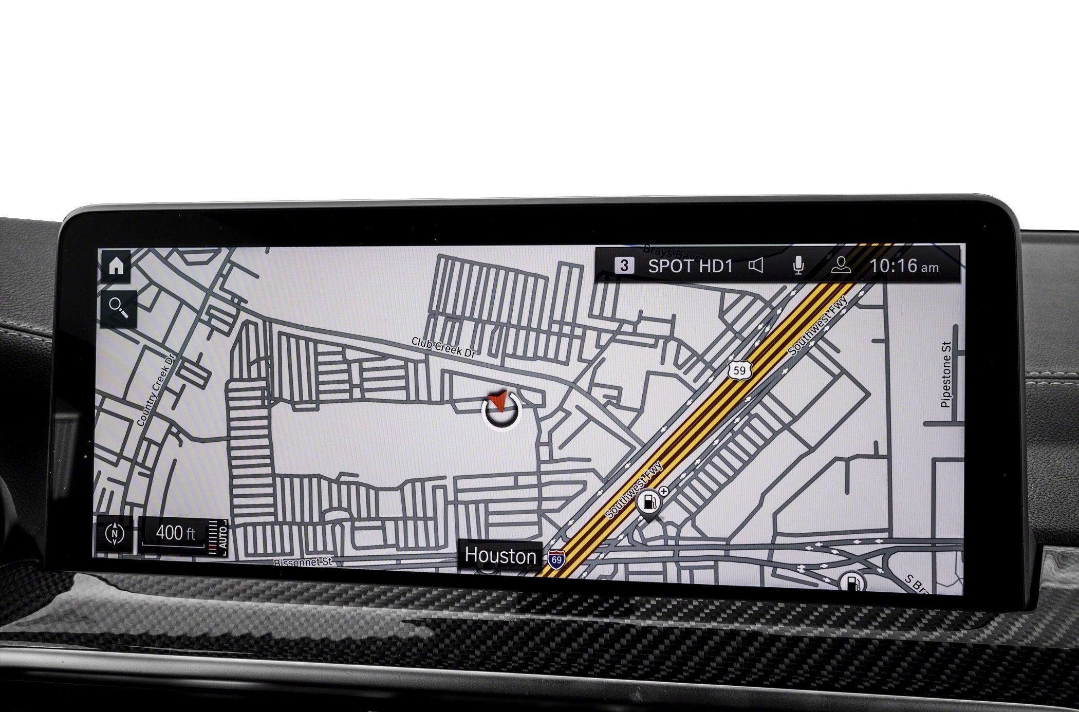 In-car navigation display showing detailed street map and route indicator.
