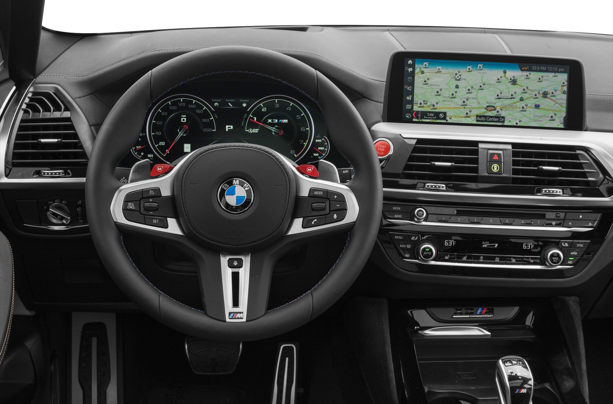 Digital dashboard, steering wheel, and navigation display in a modern sporty interior
