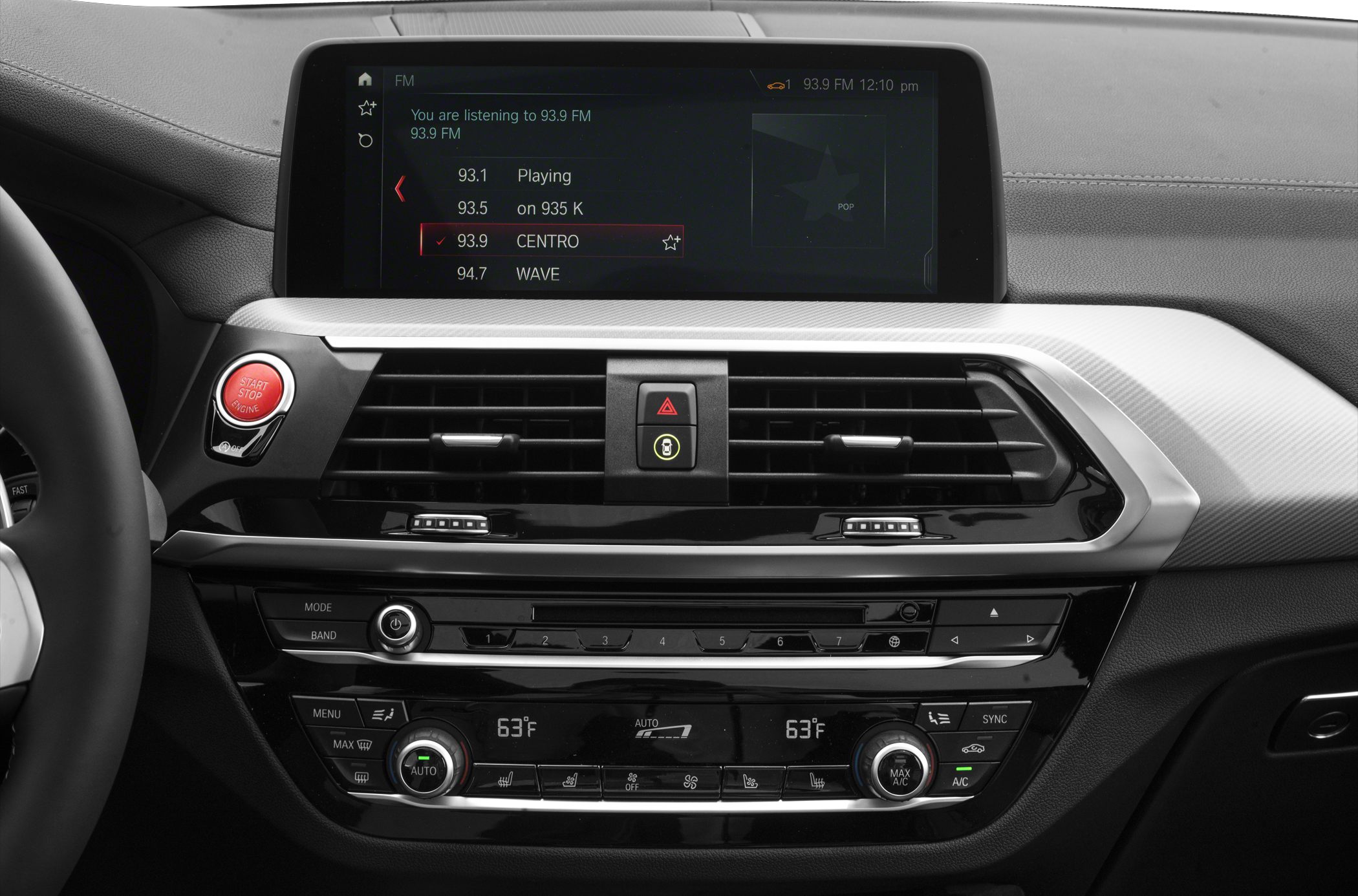 Infotainment screen, climate controls, start/stop button