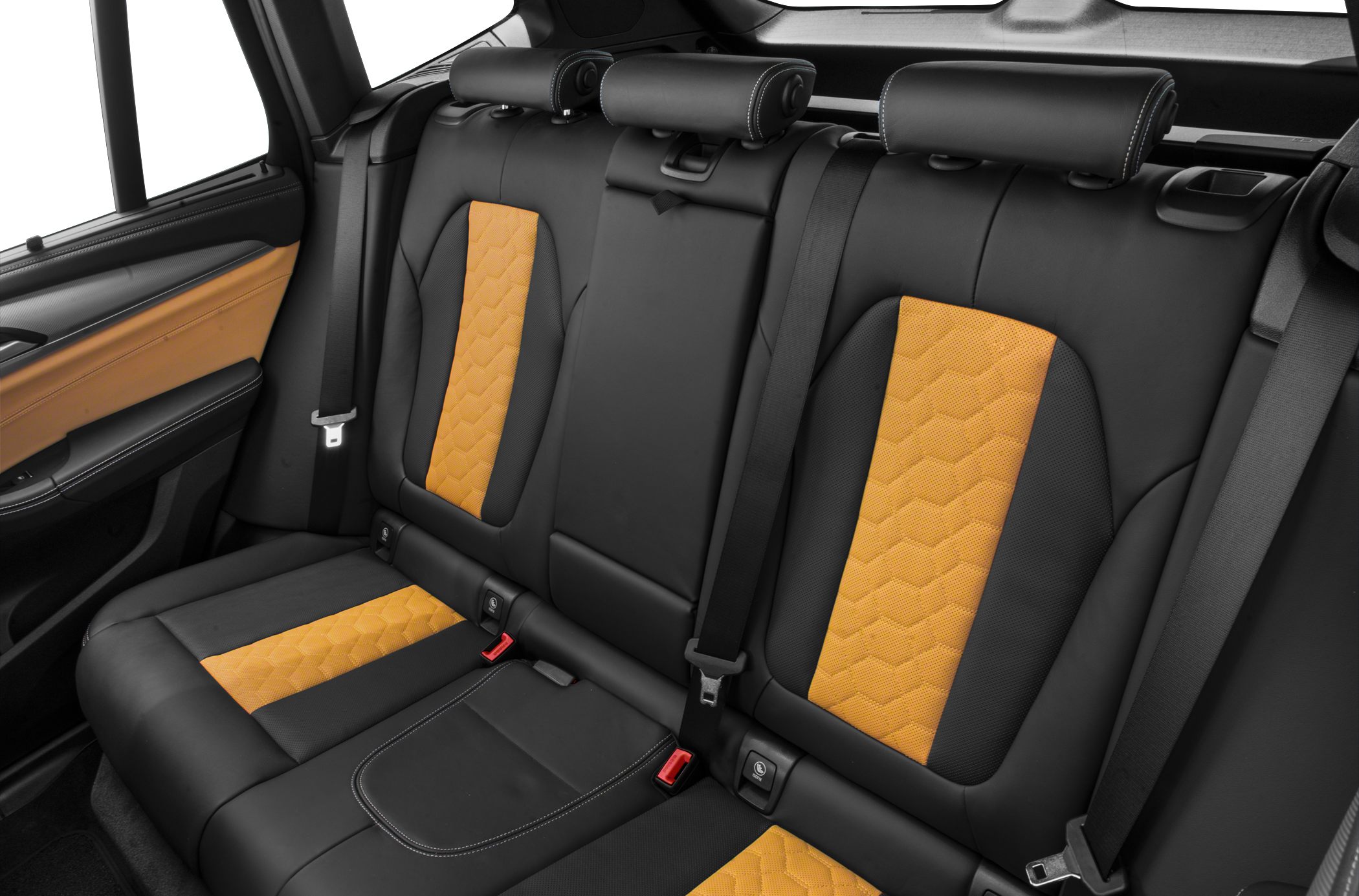 Black leather rear seats with orange contrast hexagonal stitching inserts.