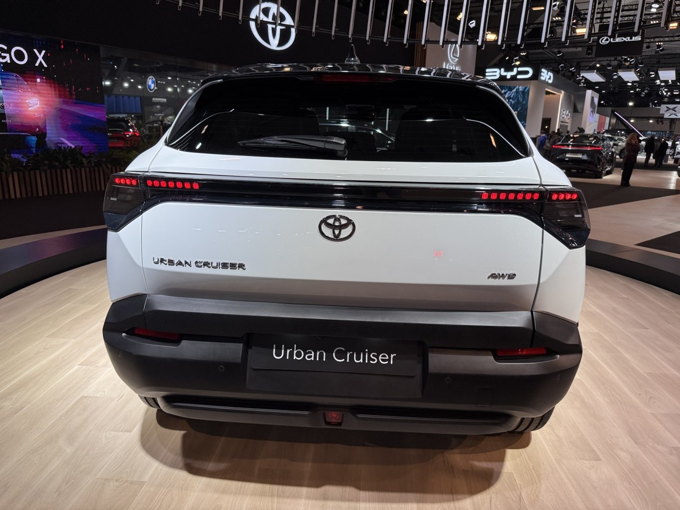 Rear view with LED tail light bar and AWD badge