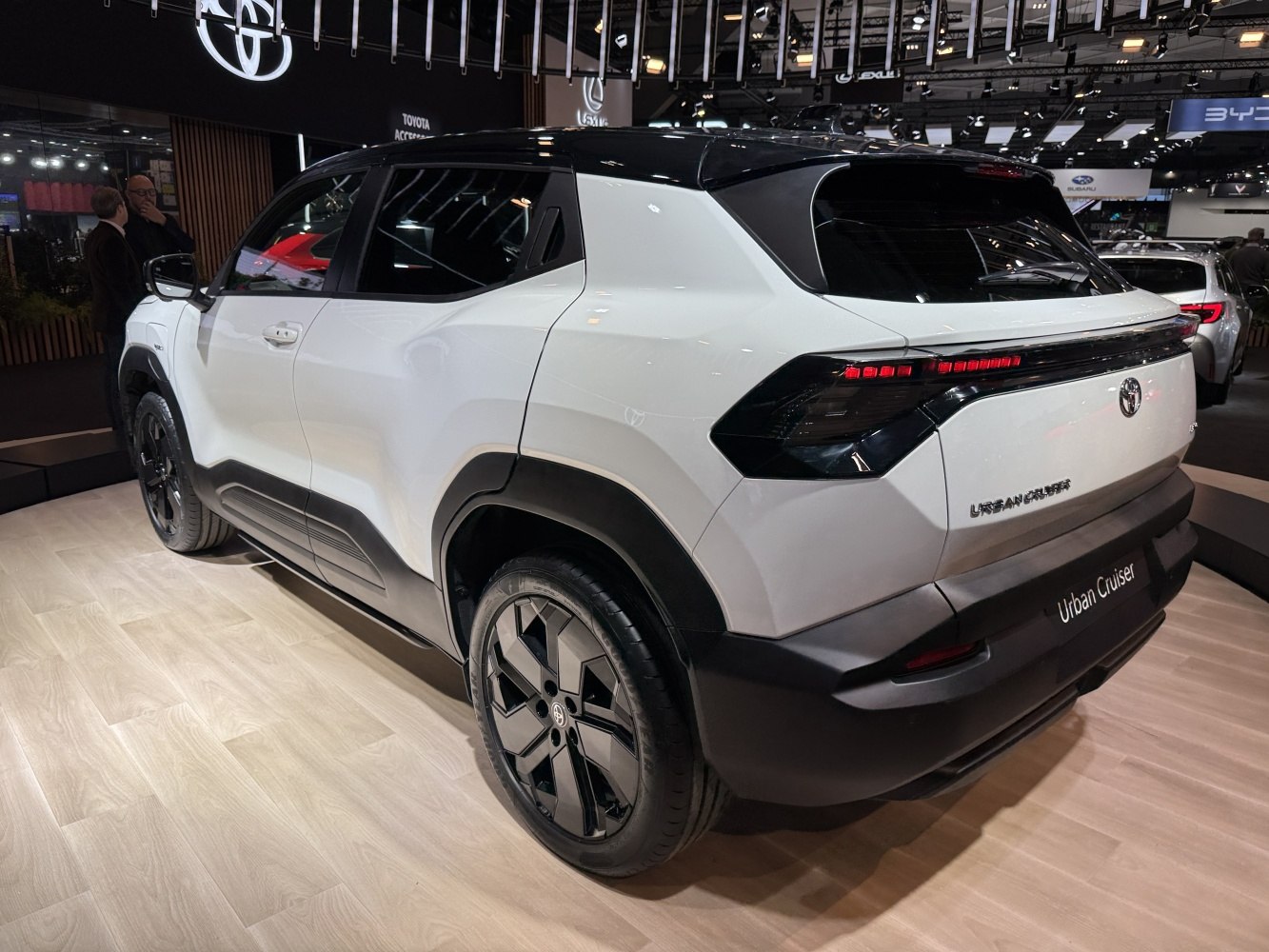 Rear and side view of a compact SUV with modern taillights and black wheels