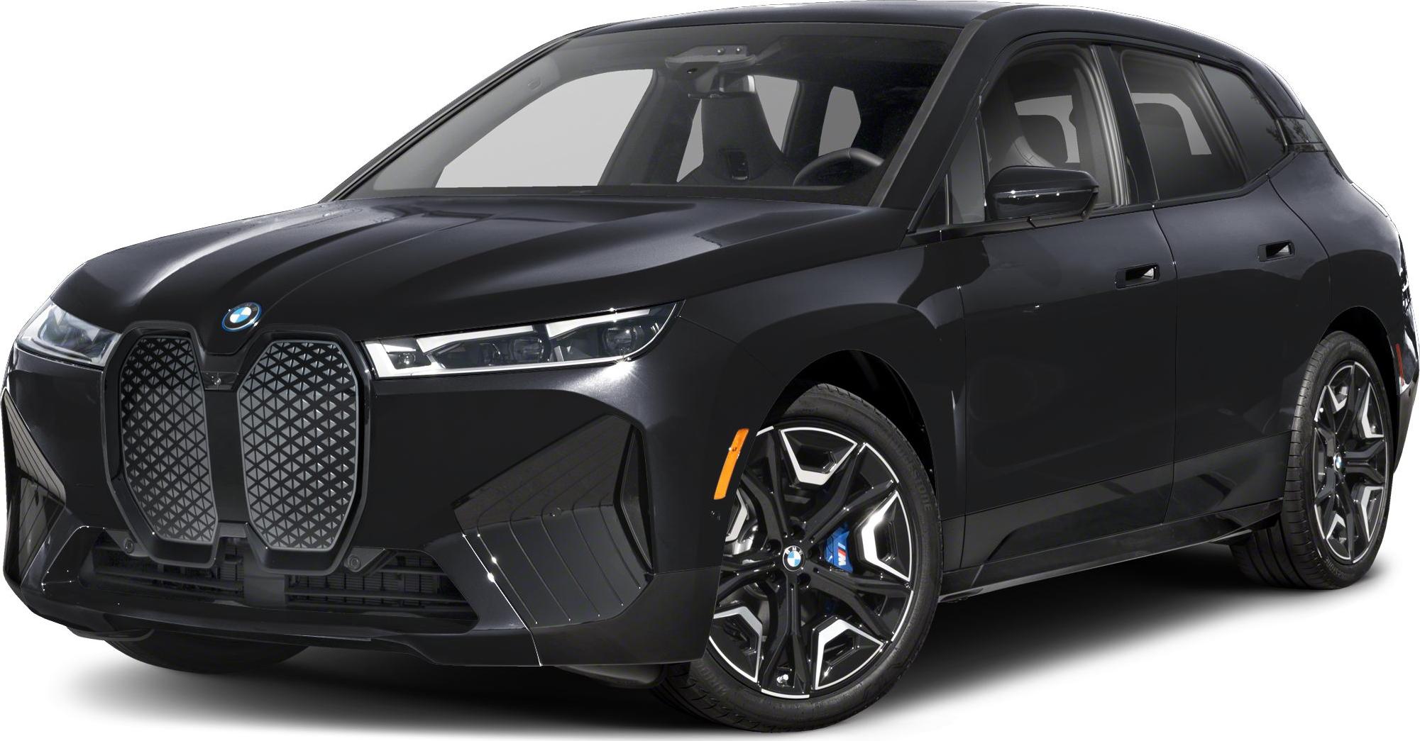 Front-side view showcasing large kidney grille and sleek LED headlights.